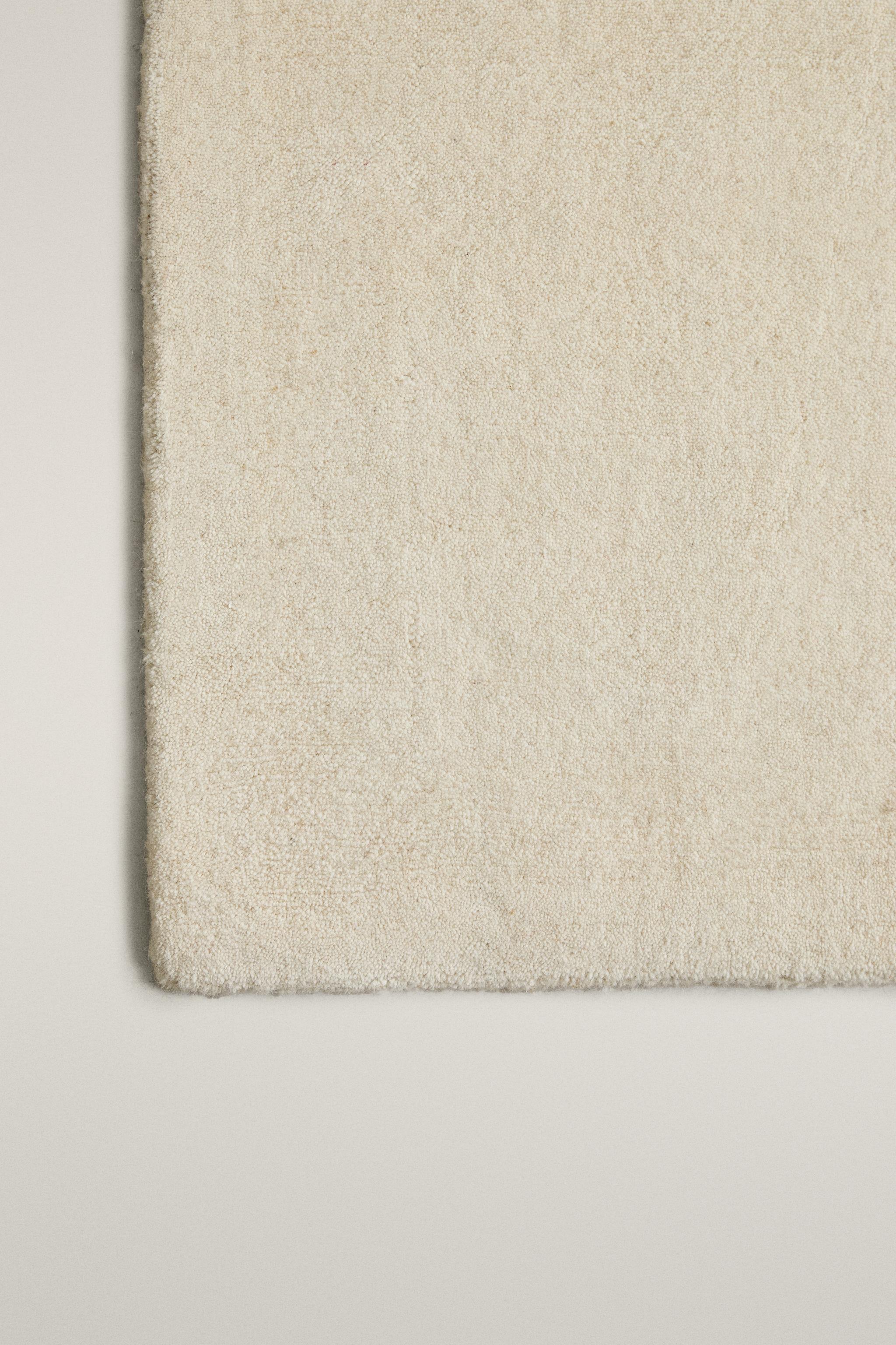 SOLID WOOL RUG