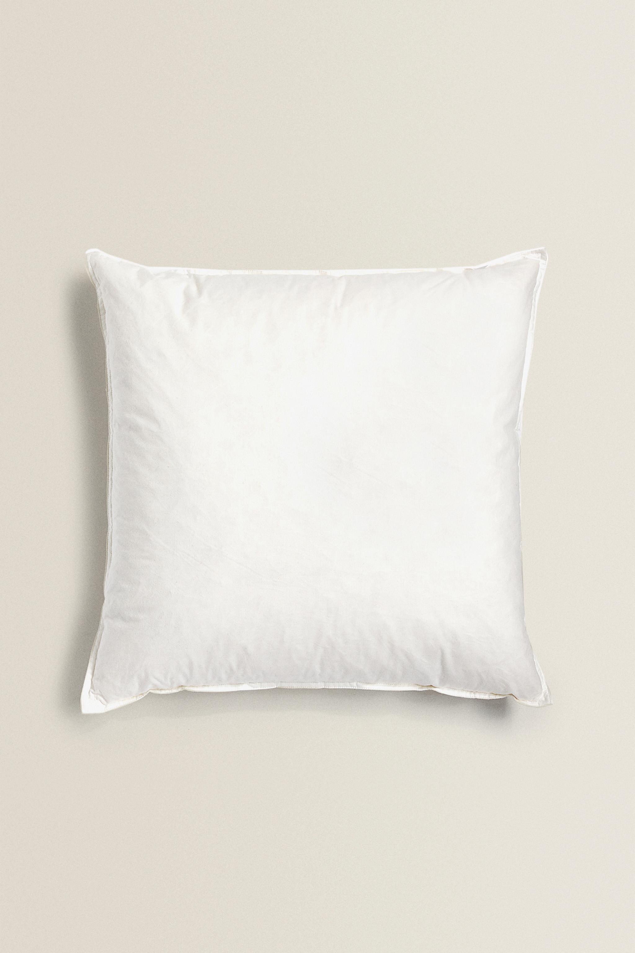 FEATHER CUSHION FILLING WITH A COTTON COVER