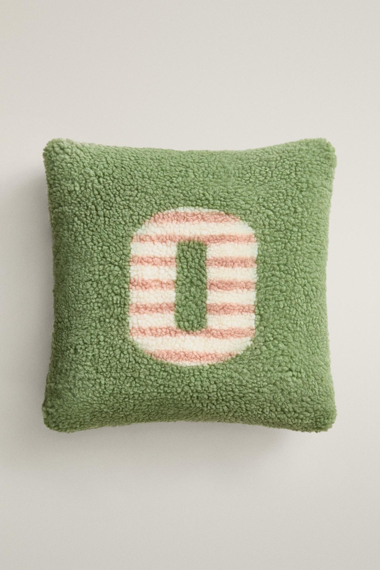 CHILDREN'S FAUX SHEARLING CUSHION WITH O