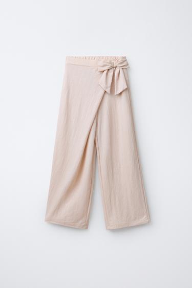 HOSE MIT WEITEM BEIN, GLITZERSTREIFEN UND SCHLEIFE - Cremefarben von Zara