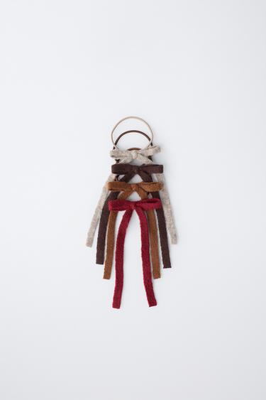 LOT DE QUATRE CHOUCHOUS À NŒUD EN MAILLE - Kaki de Zara