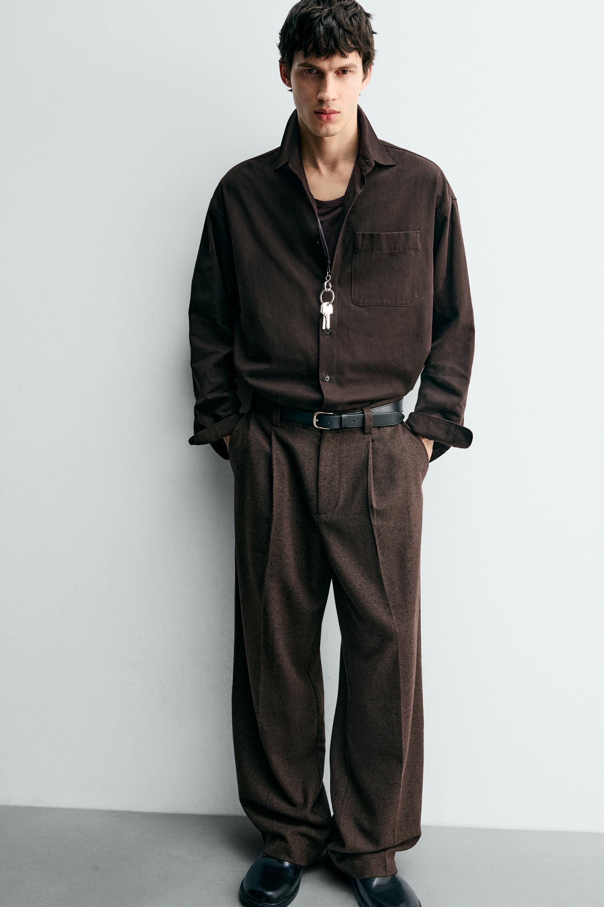 PANTALON BOUTONNÉ À PLIS