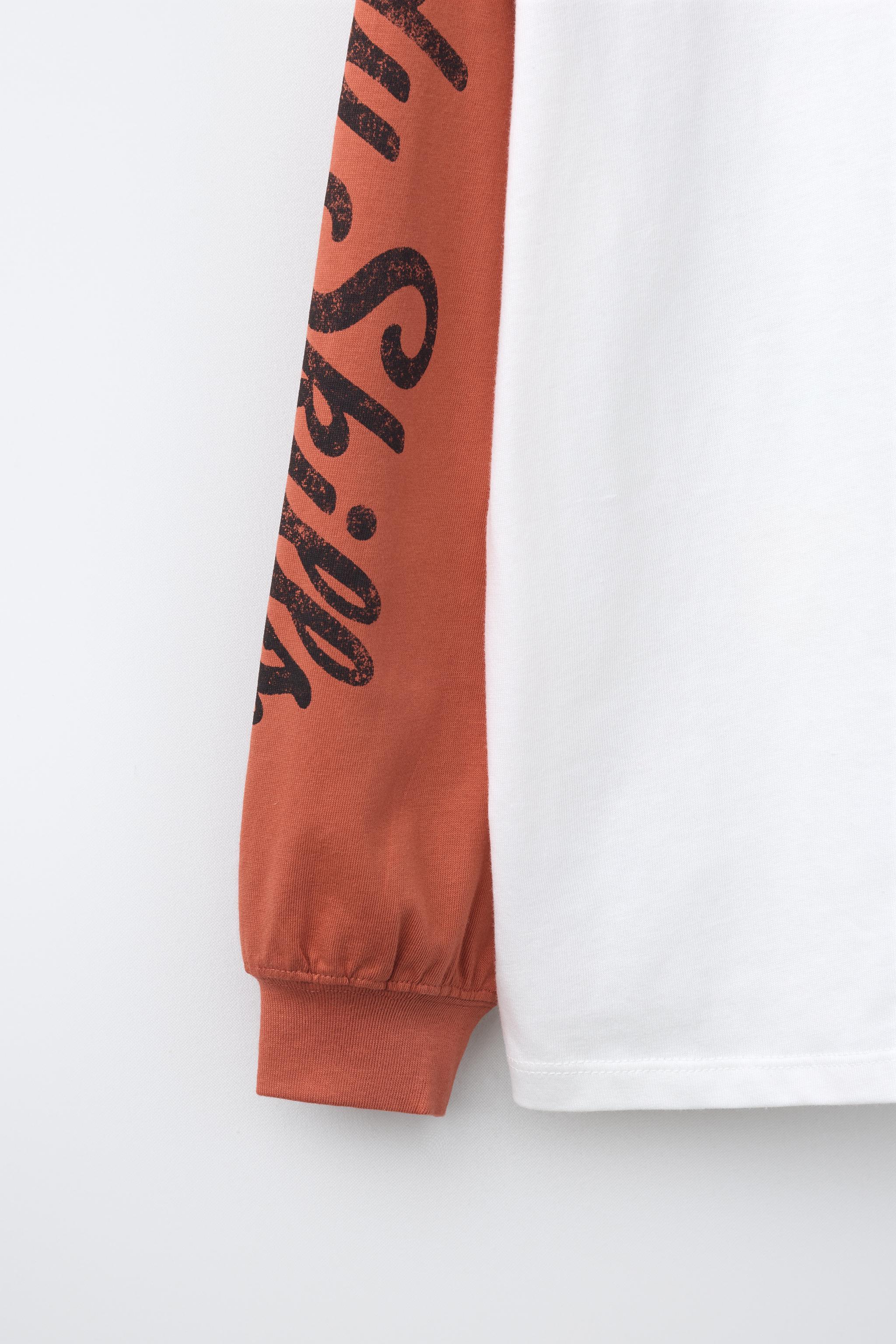 RAGLAN SLEEVE PRINTED T-SHIRT