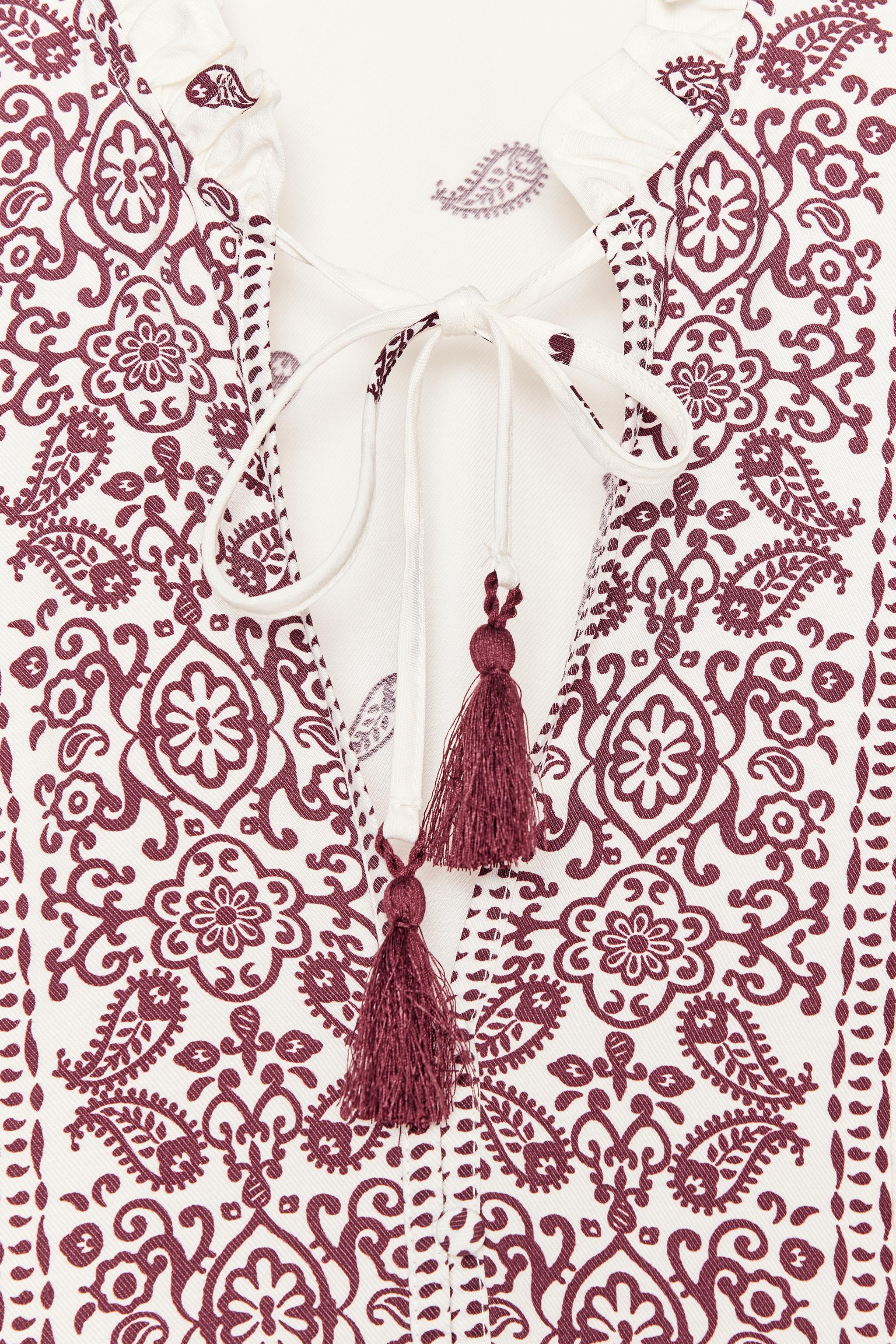 BLOUSE IMPRIMÉE À POMPONS