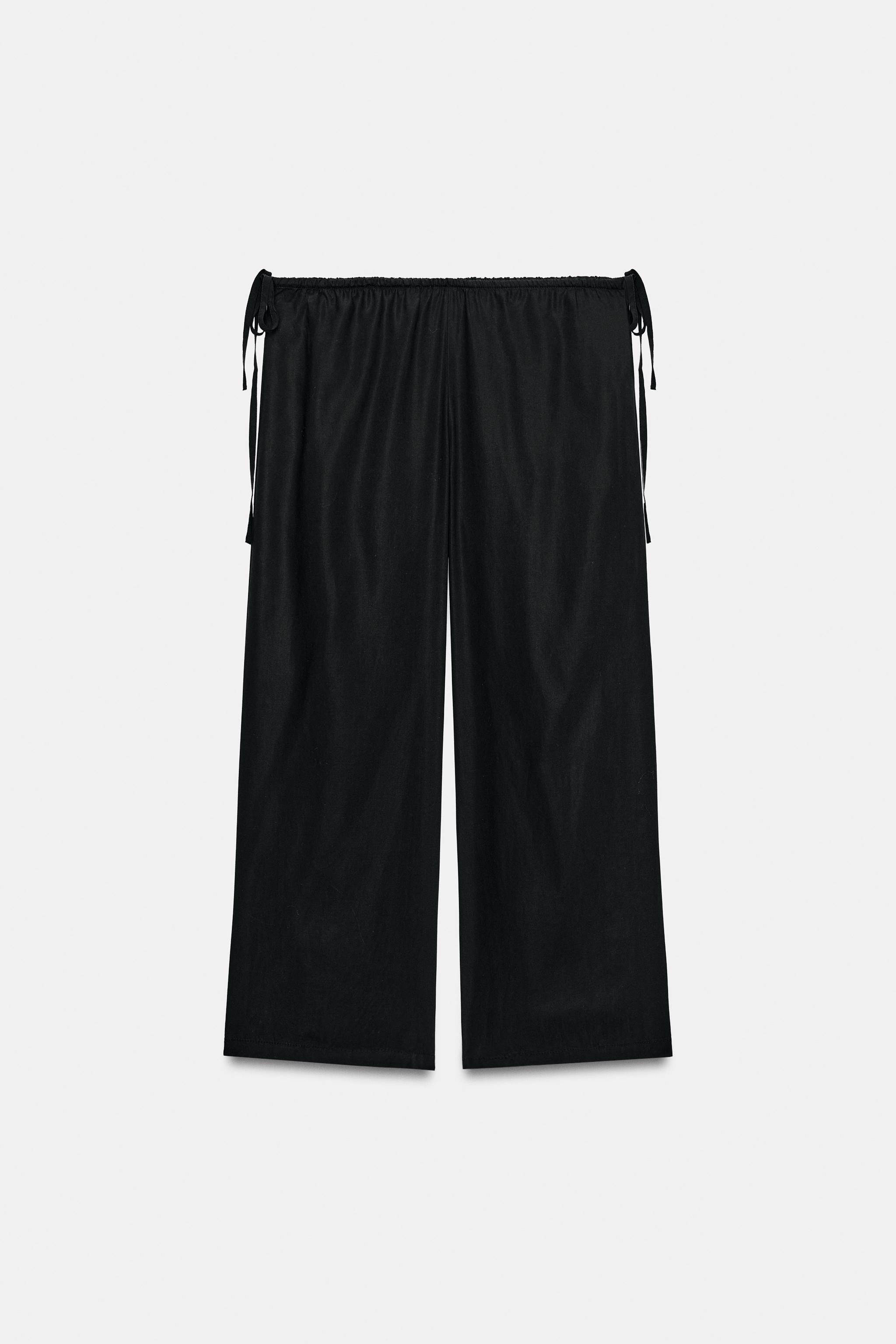 TIED ANKLE-LENGTH FLOWY PANTS