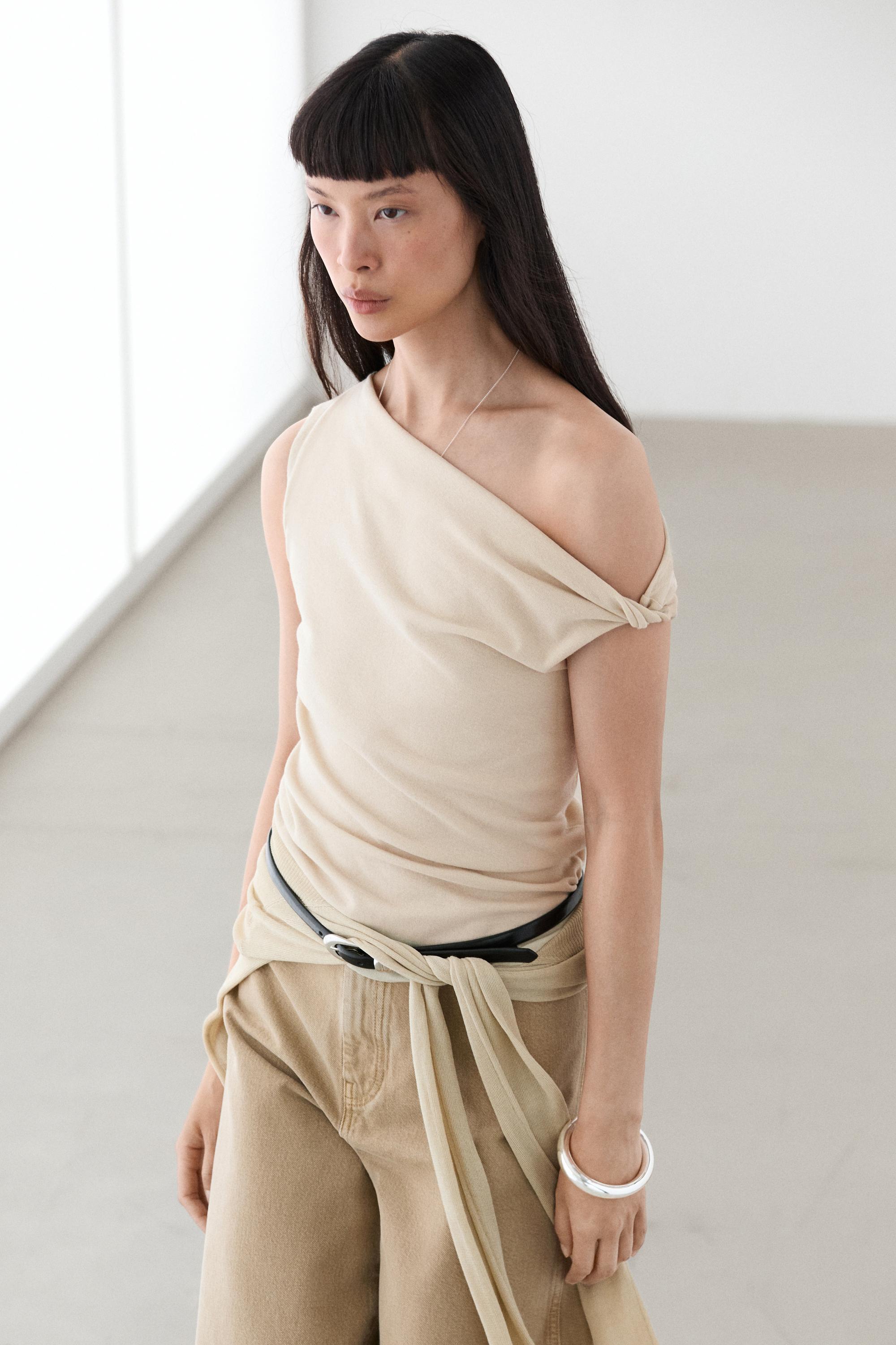 Asymmetric drop sleeve top