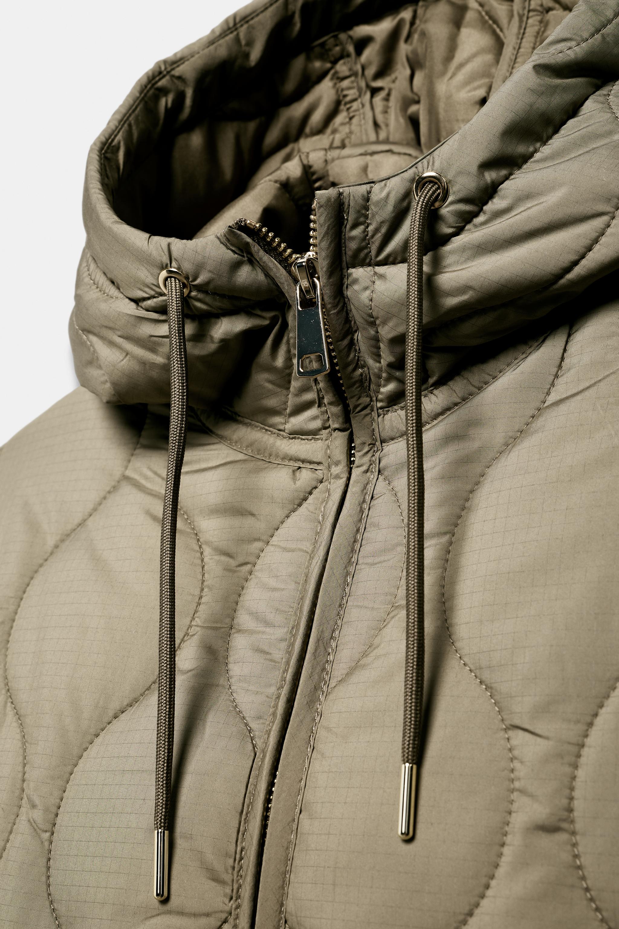 BLOUSON REMBOURRÉ À CAPUCHE DÉPERLANT