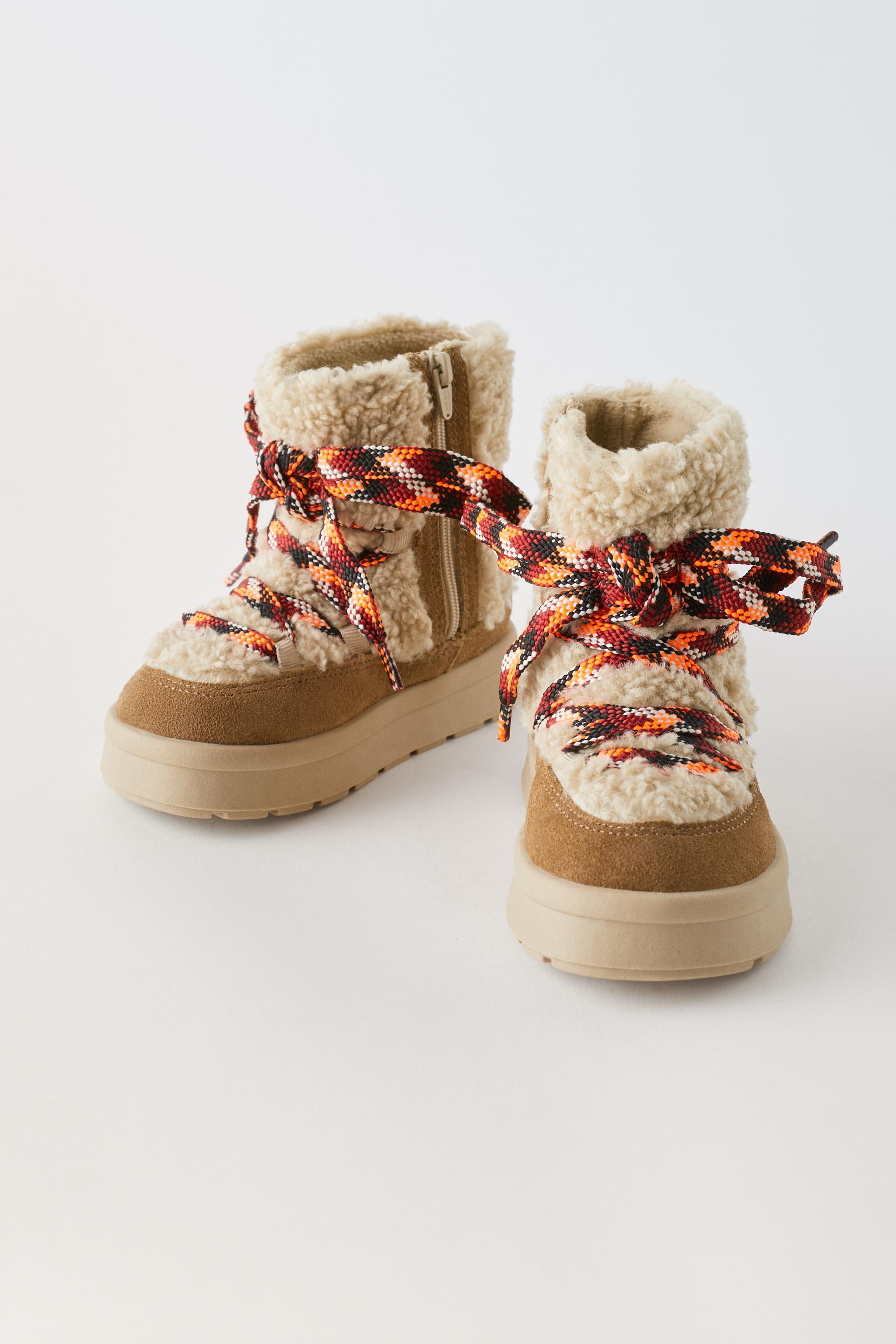 Eskis faux outlet shearling boots