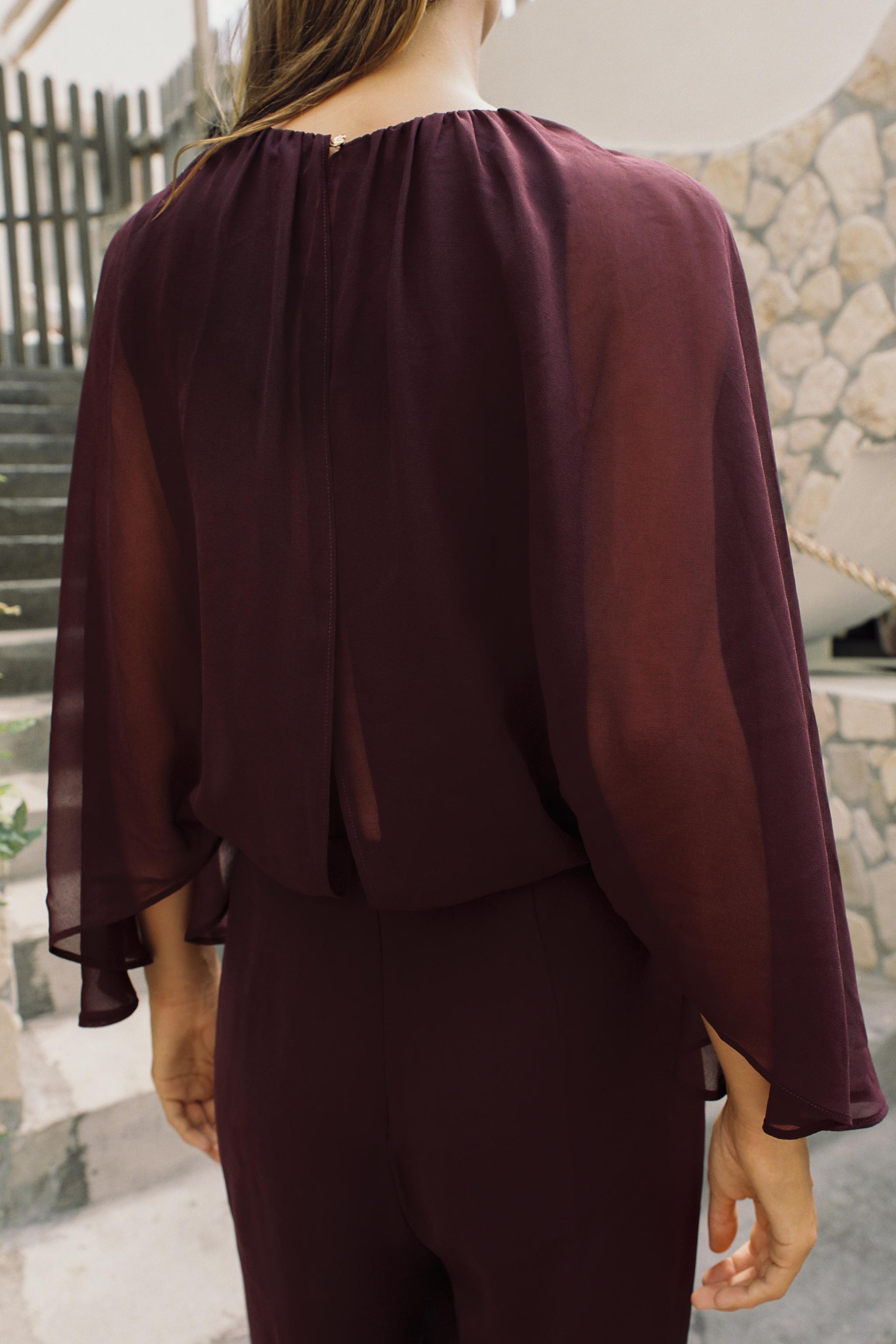CAPE SLEEVE BELTED JUMPSUIT