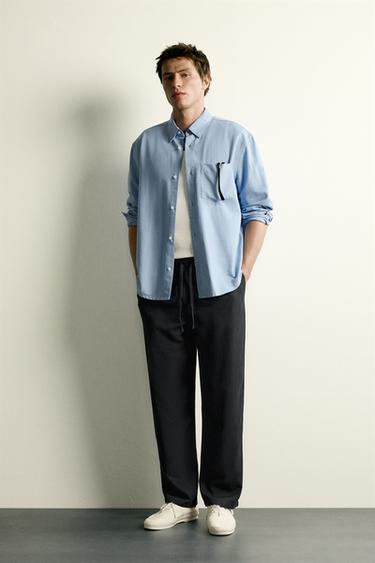 100% LYOCELL RELAXED FIT TROUSERS - Black by Zara
