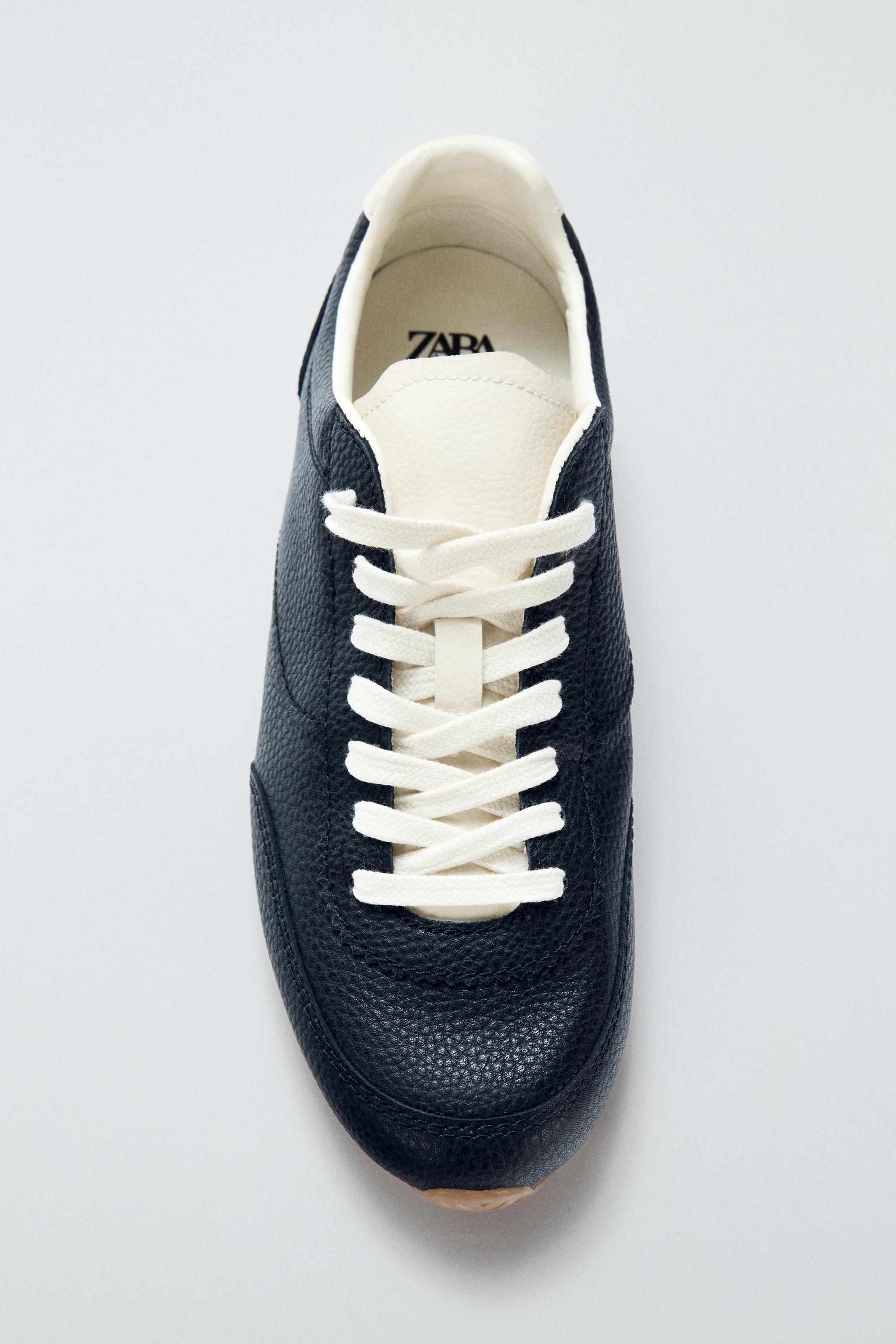 CONTRAST LEATHER TRAINERS