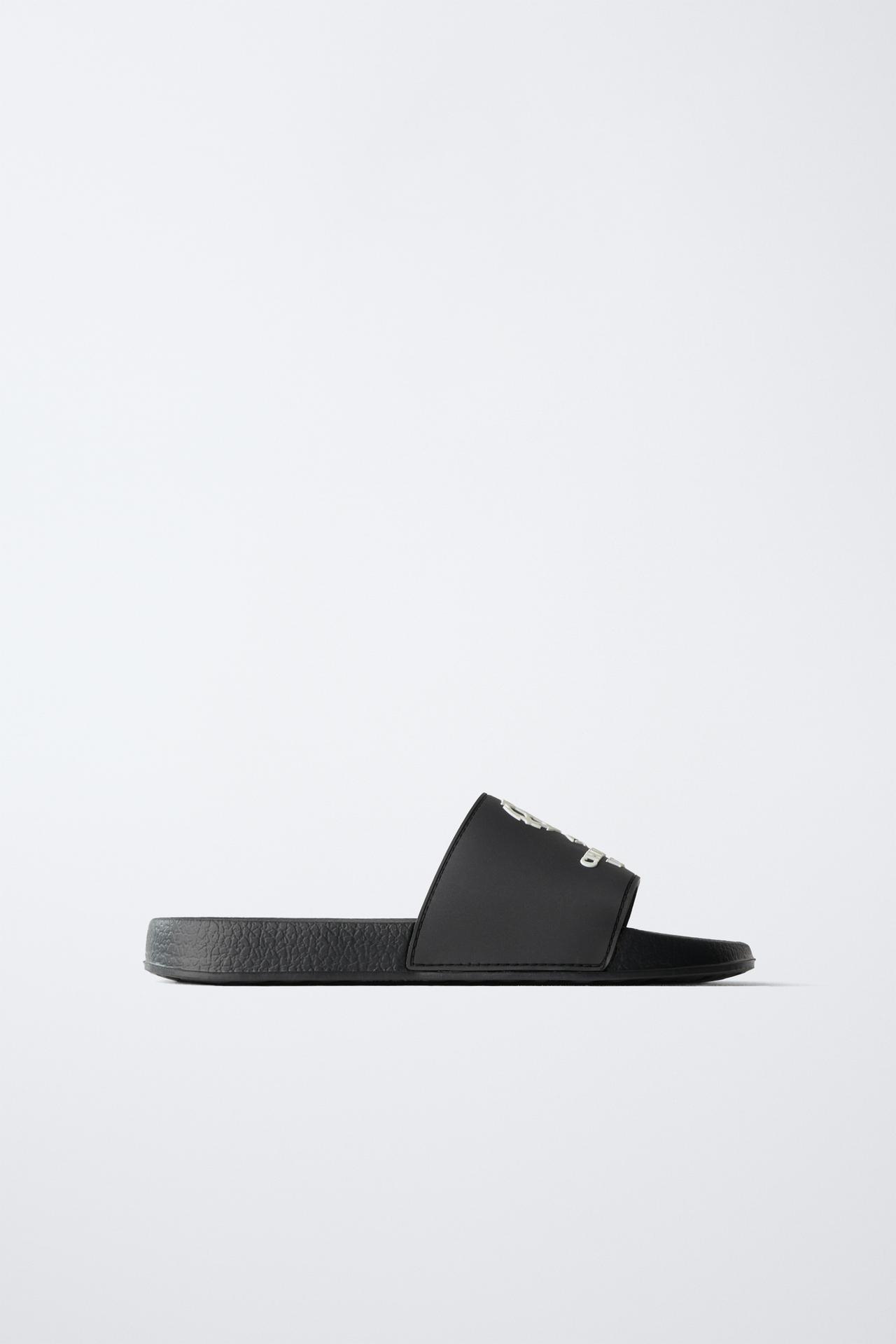 UEFA CHAMPIONS LEAGUE® GLOW-IN-THE-DARK POOL SLIDES — Black