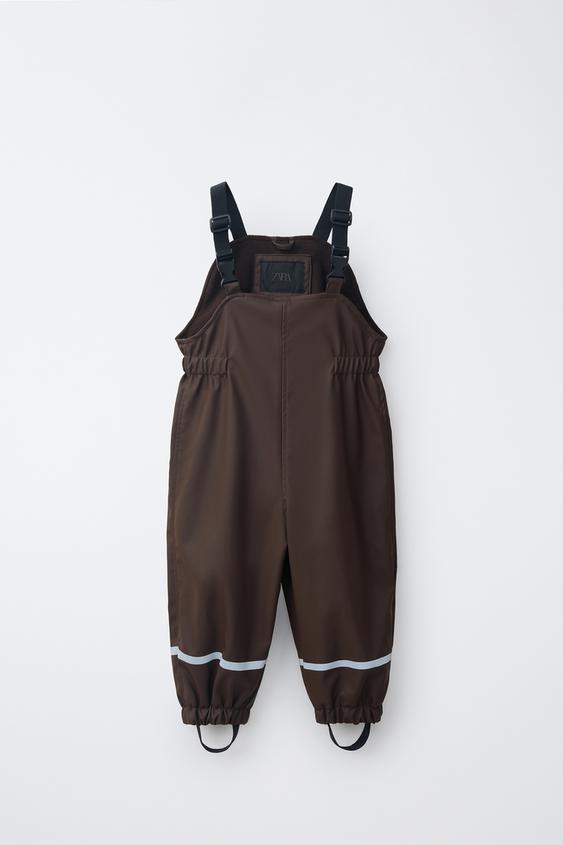WATER-RESISTANT RUBBERISED JUMPSUIT - Brown by Zara - Image 0