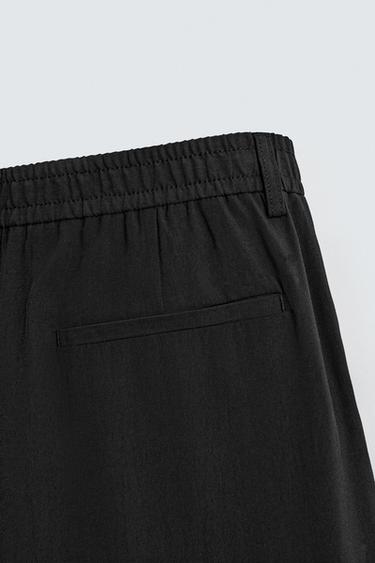 PANTALÓN FLUIDO PLIEGUES - Negro de Zara