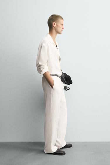 PANTALÓN RELAXED FIT PLIEGUES - Blanco de Zara