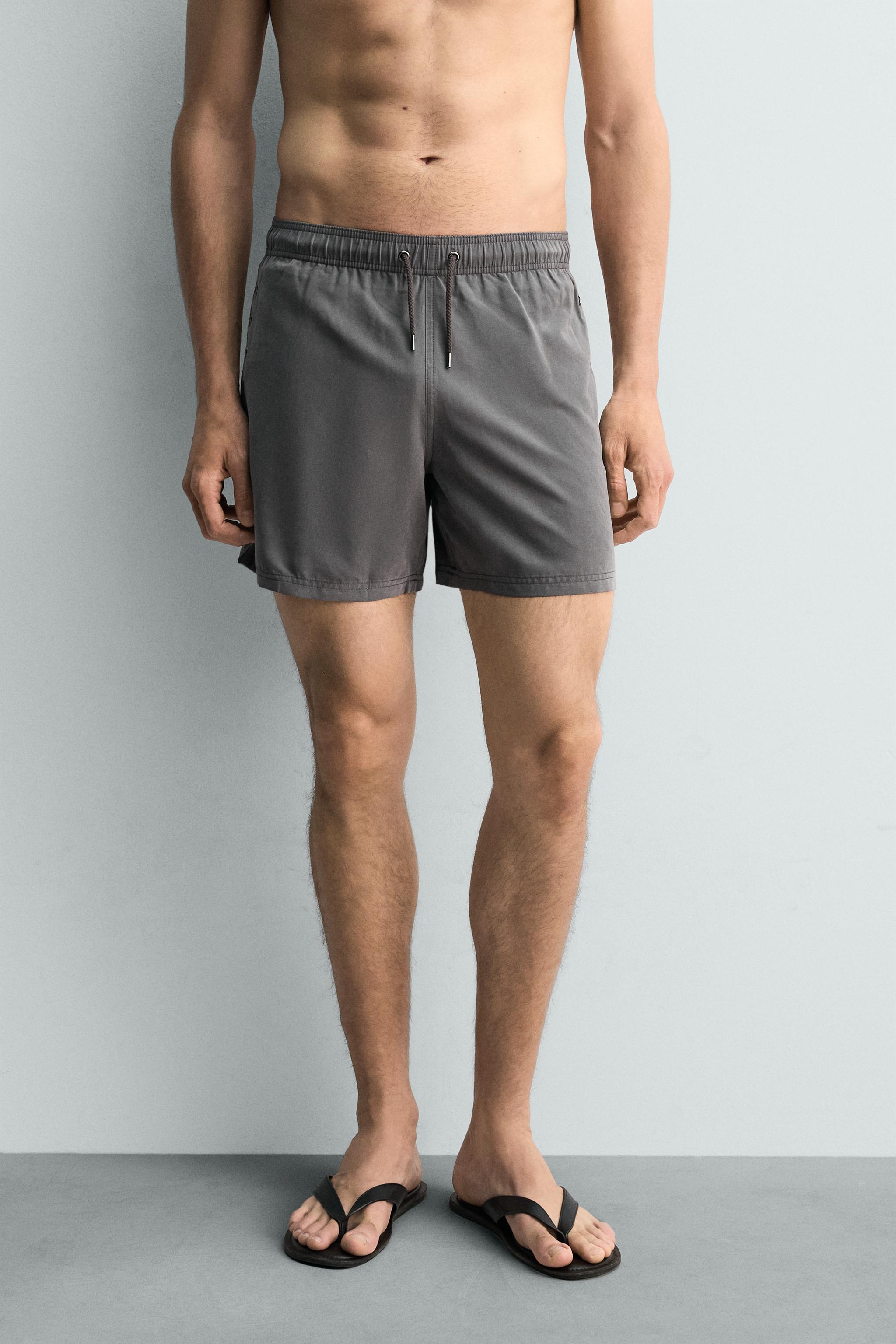MAILLOT DE BAIN MI-LONG À ŒILLETS MÉTALLIQUES