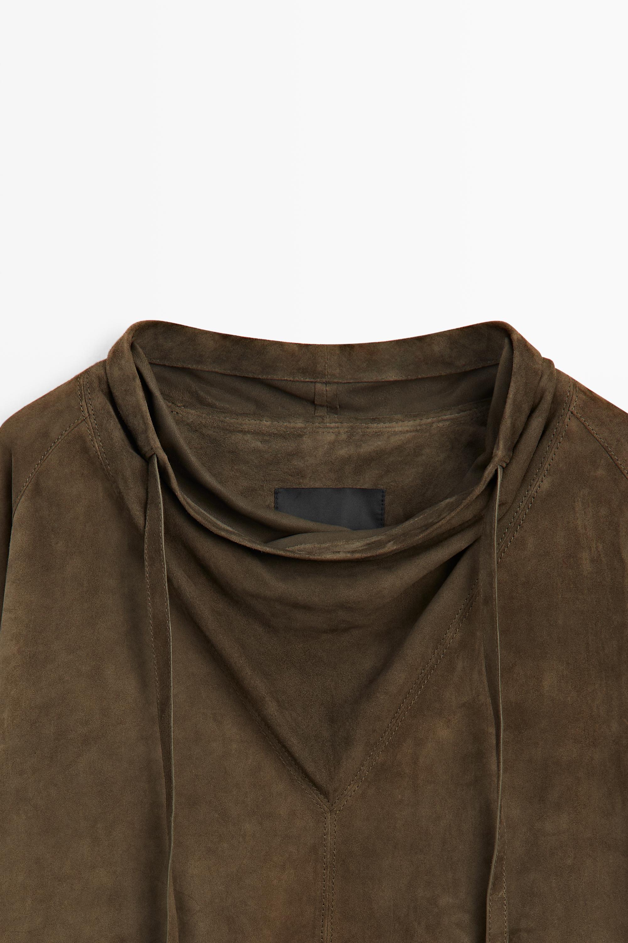 High-neck suede shirt