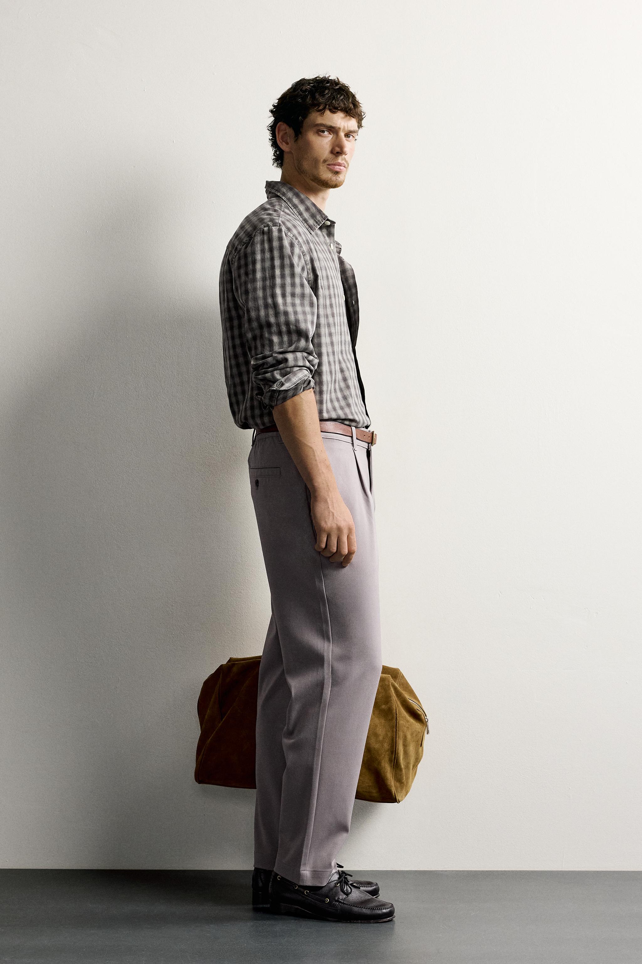 RELAXED FIT PLEATED PANTS