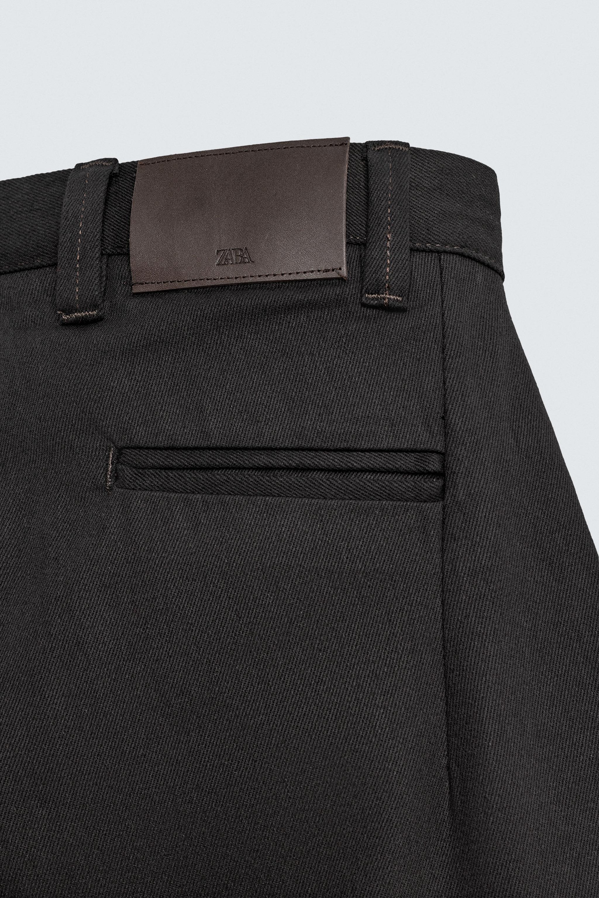 PLEATED BALLOON FIT JEANS