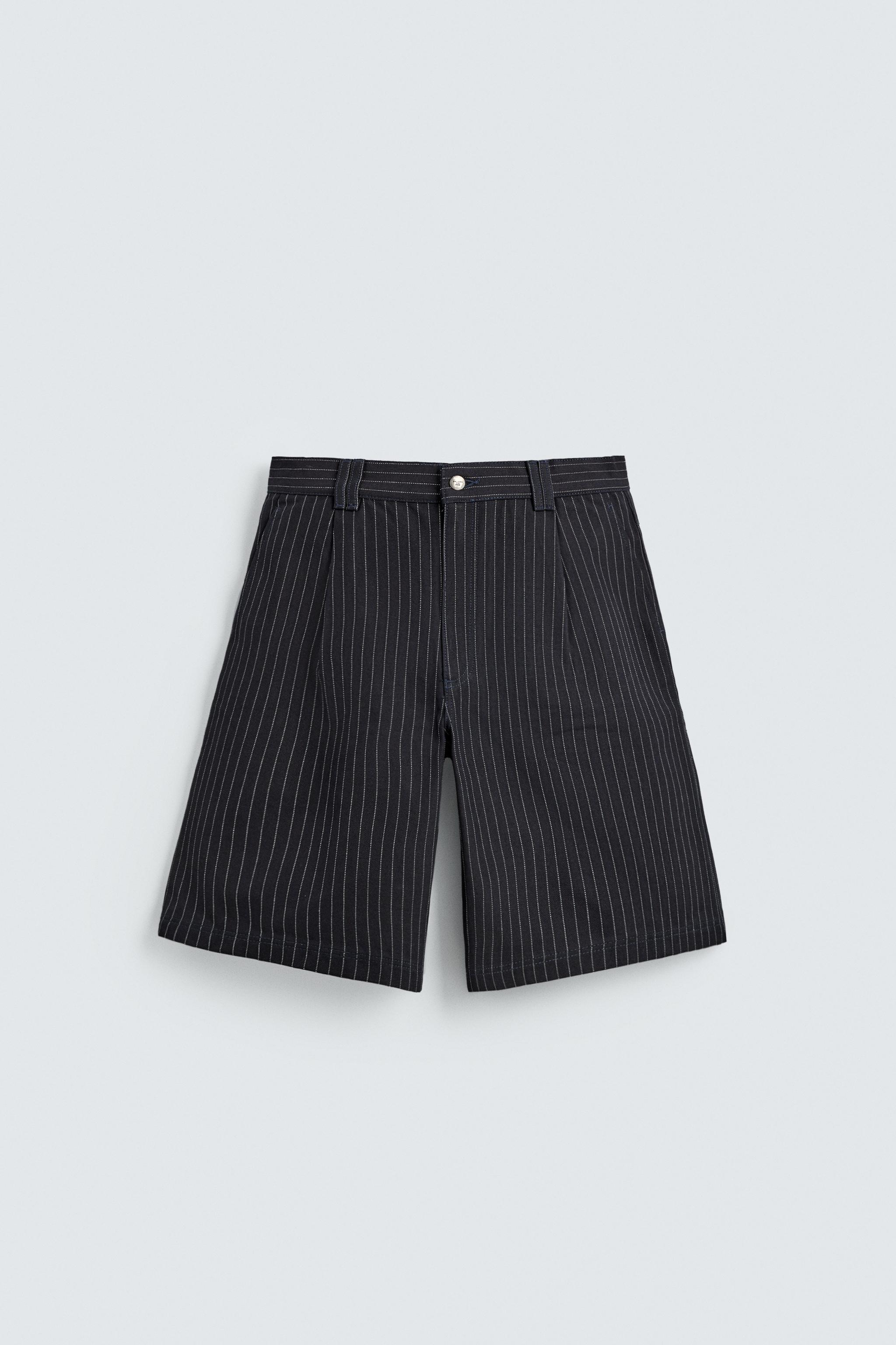 PINSTRIPED PLEATED SHORTS