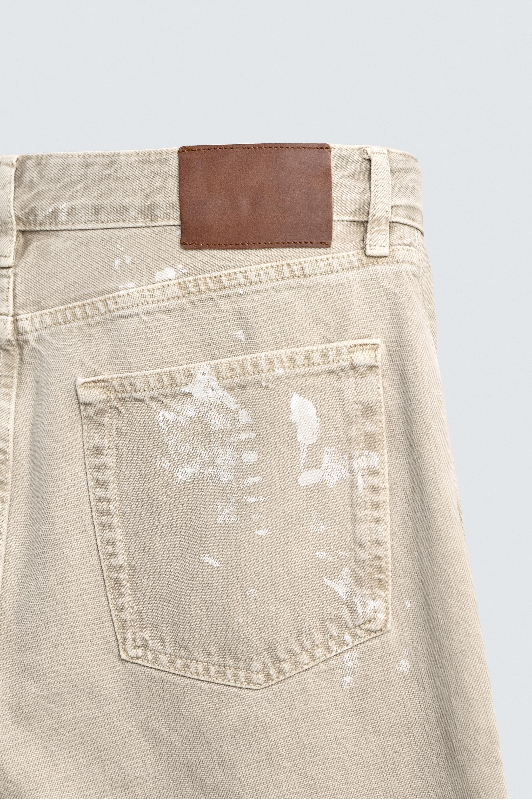 SPLASH EFFECT FLARE FIT JEANS