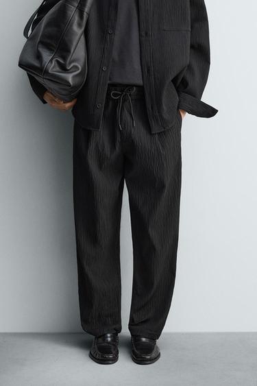 RELAXED FIT RAISED FABRIC TROUSERS - Black by Zara