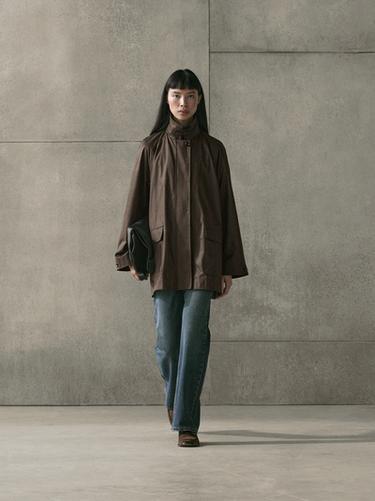 Parka longue détail poches - Noir or de Zara