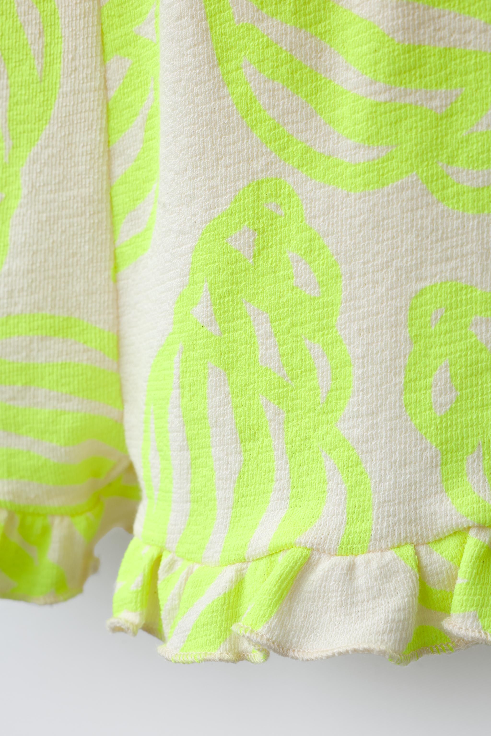 SHORT KNOTTED NEON SHELL PRINT JUMPSUIT
