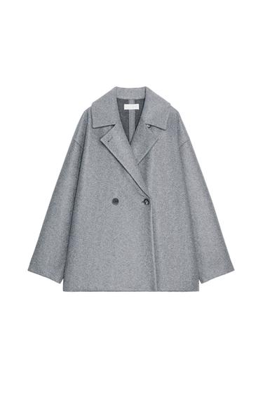 Front view of a light grey short coat with a lapel collar, long sleeves, and a double-breasted button fastening.