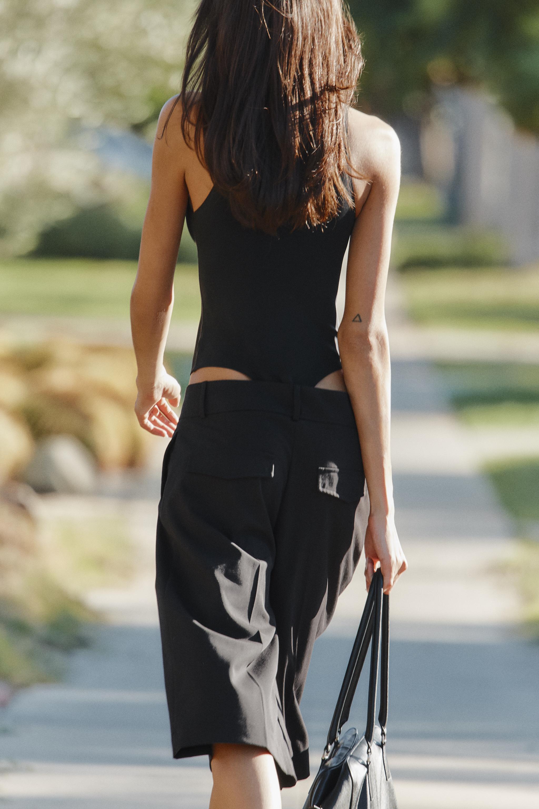 PLEATED FAUX LEATHER LONG BERMUDA SHORTS