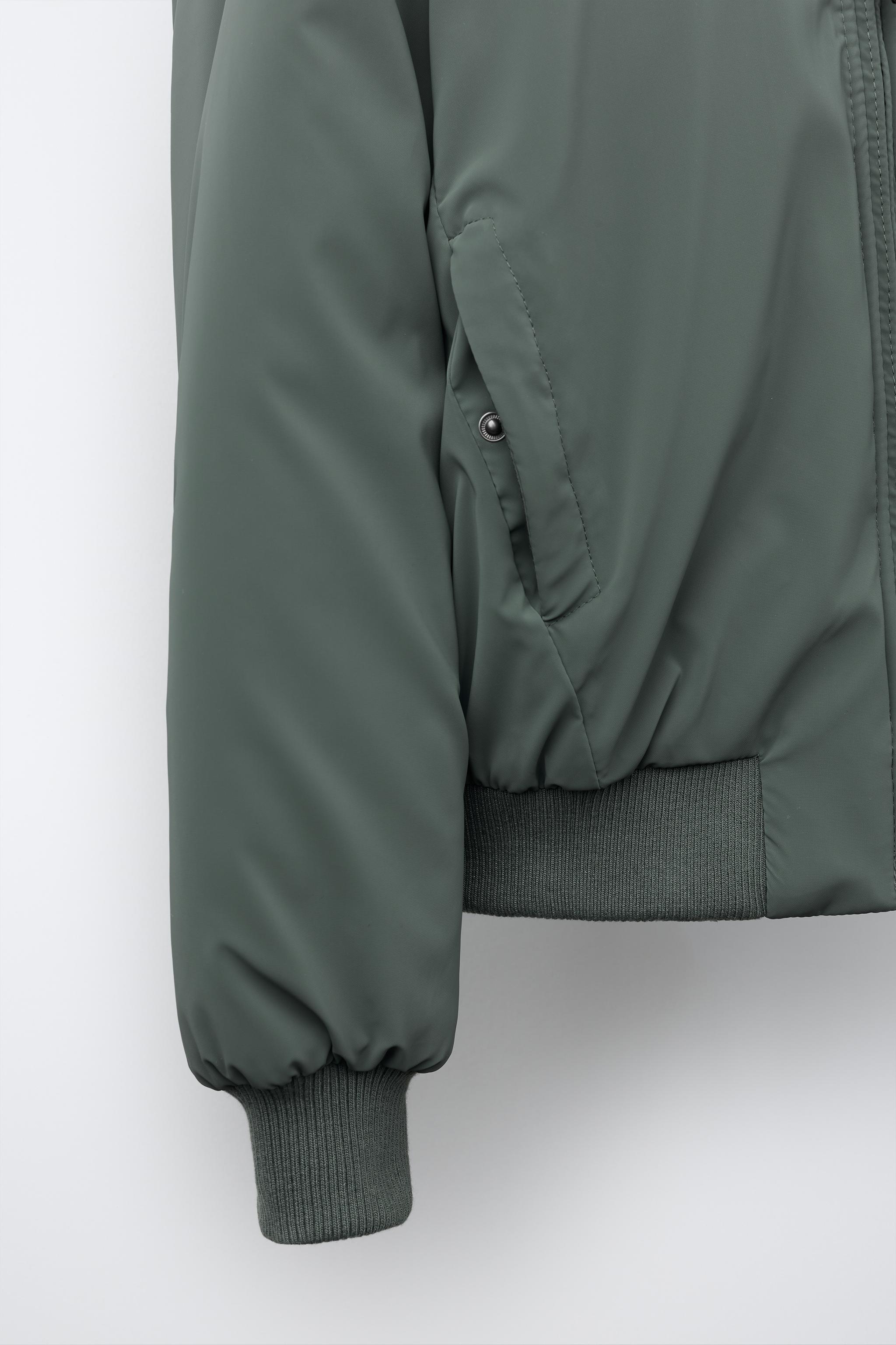BLOUSON BOMBER GOMMÉ À CAPUCHE AMOVIBLE