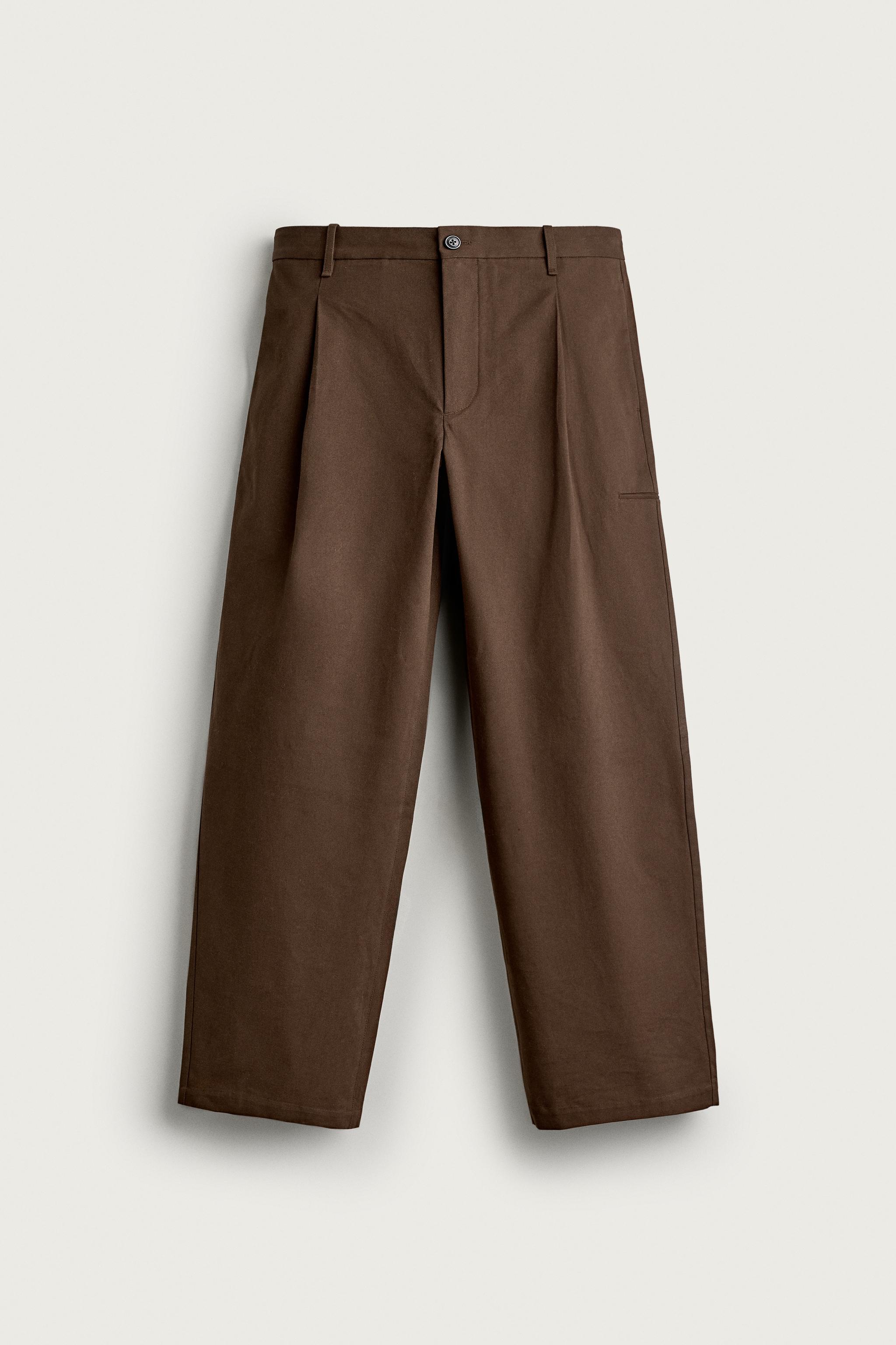 RELAXED FIT PLEATED PANTS