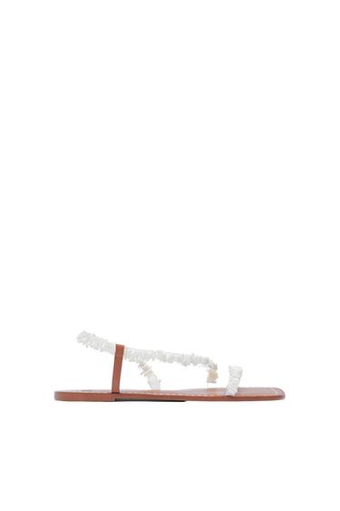 FLAT SANDALS WITH BEADED STRAPS