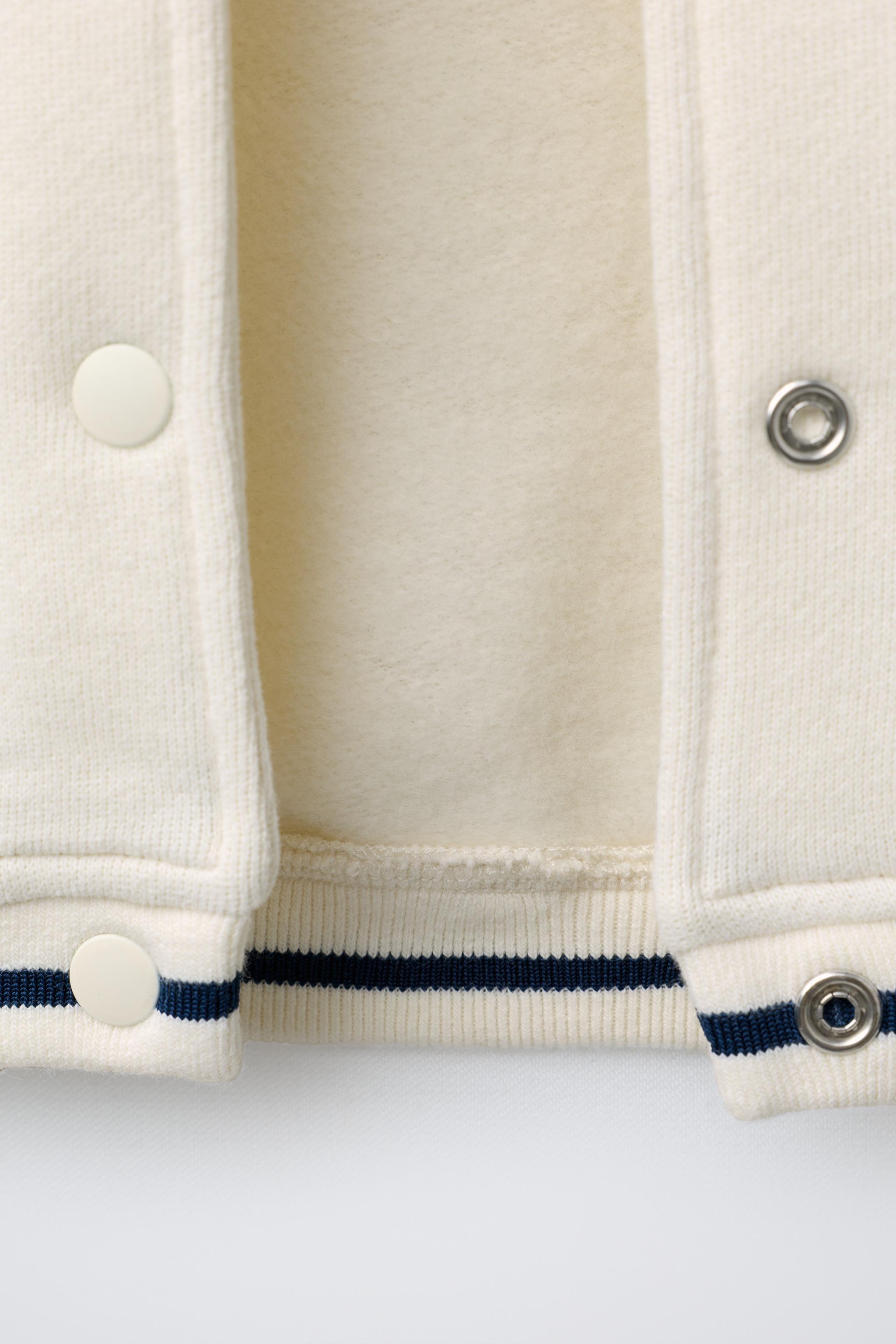 BLOUSON BOMBER EN MOLLETON SNOOPY PEANUTS™