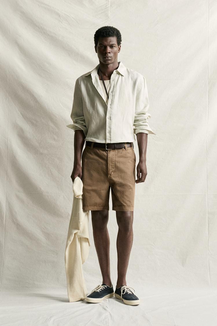 VINTAGE-EFFECT WASHED BERMUDA SHORTS