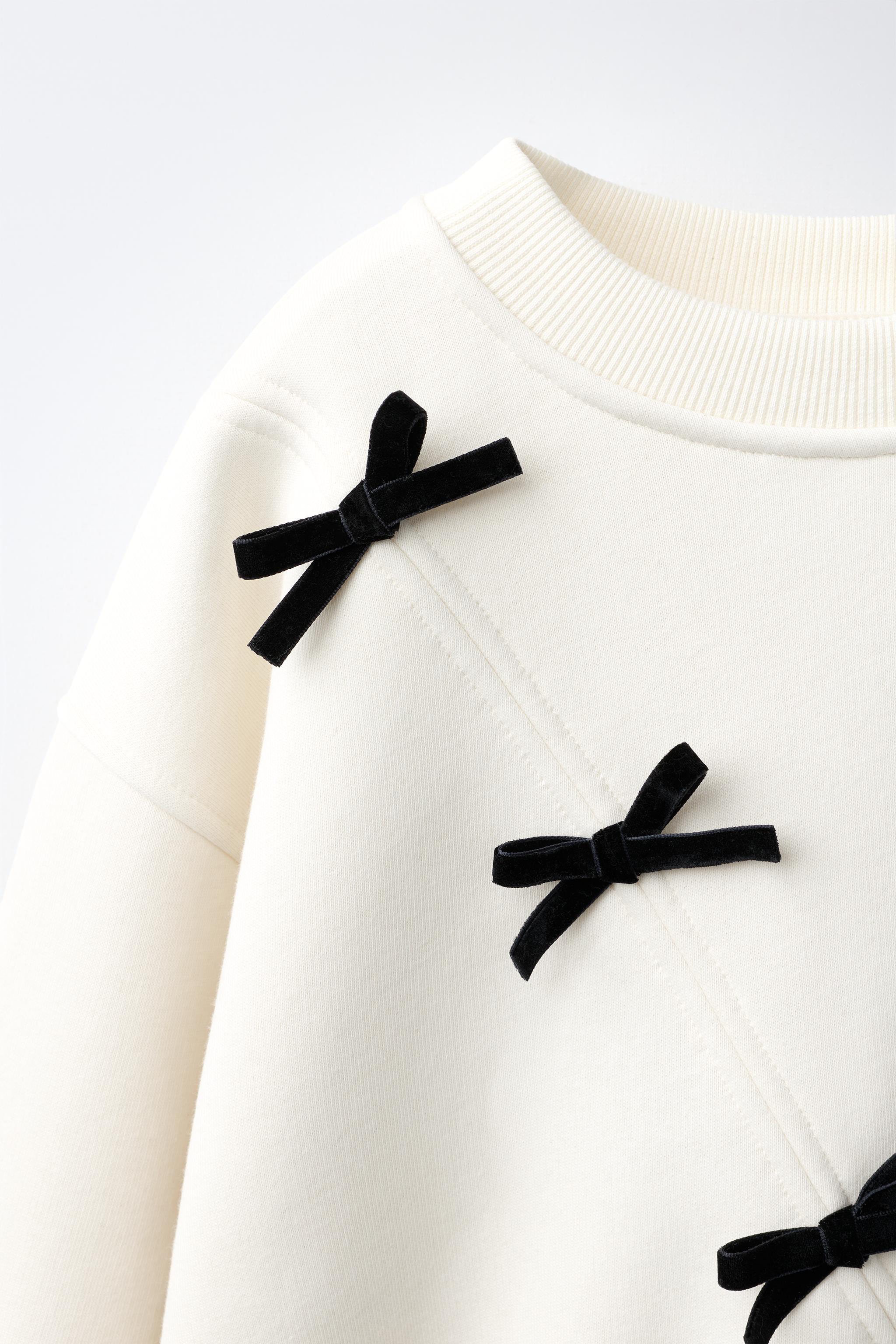 FLOCK BOW SWEATSHIRT