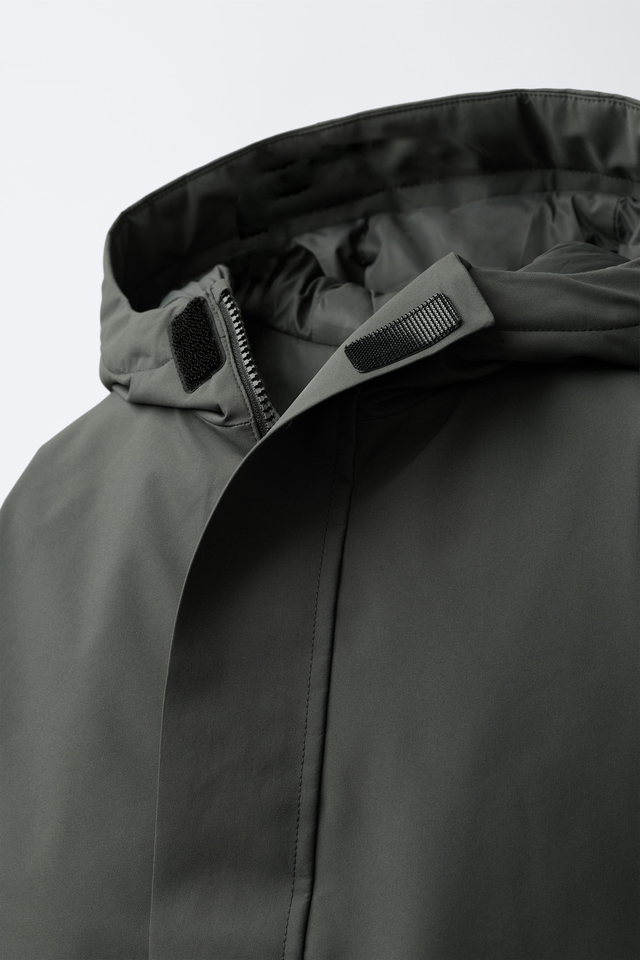 DOUDOUNE EN PLUME ET DUVET DÉPERLANTE AVEC ÉTIQUETTE