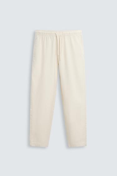 Zara TEXTURED RELAXED FIT PANTS - Light beige