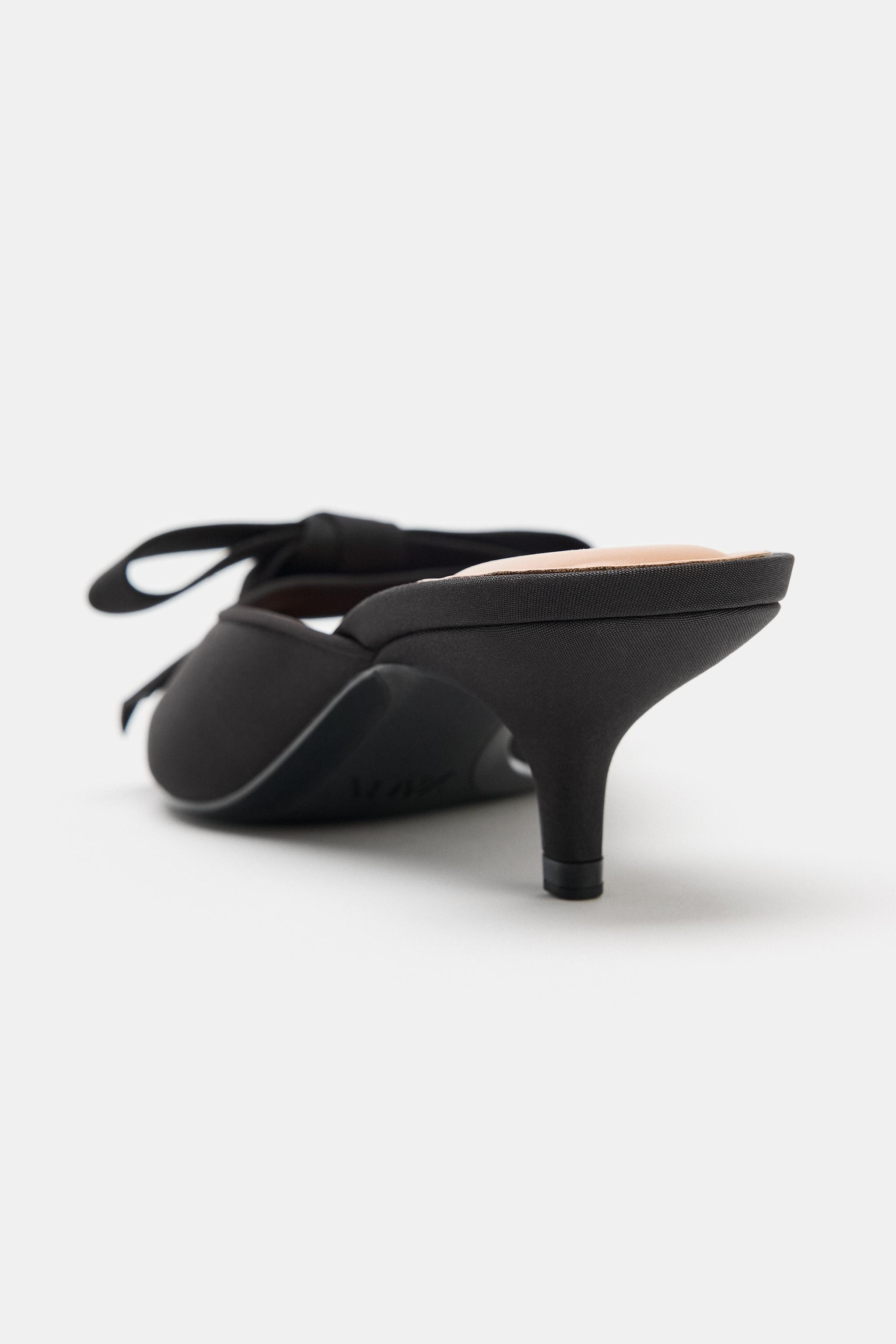 BOW HEELED SANDALS