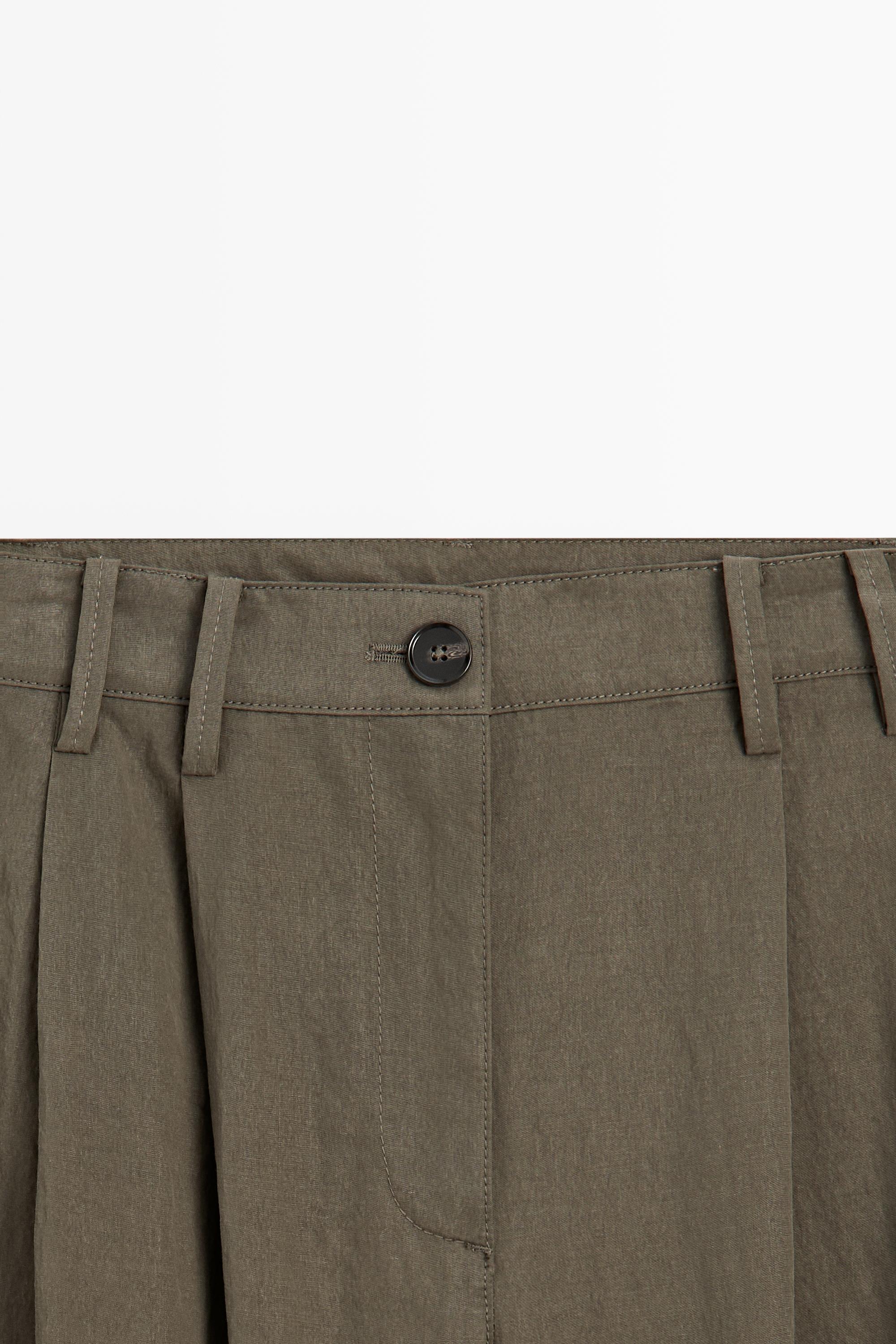 Technical wide-leg pleated pants
