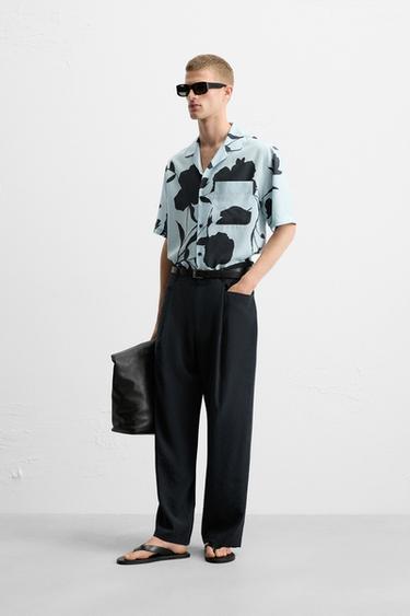 PANTALÓN RELAXED FIT PLIEGUES - Marino de Zara