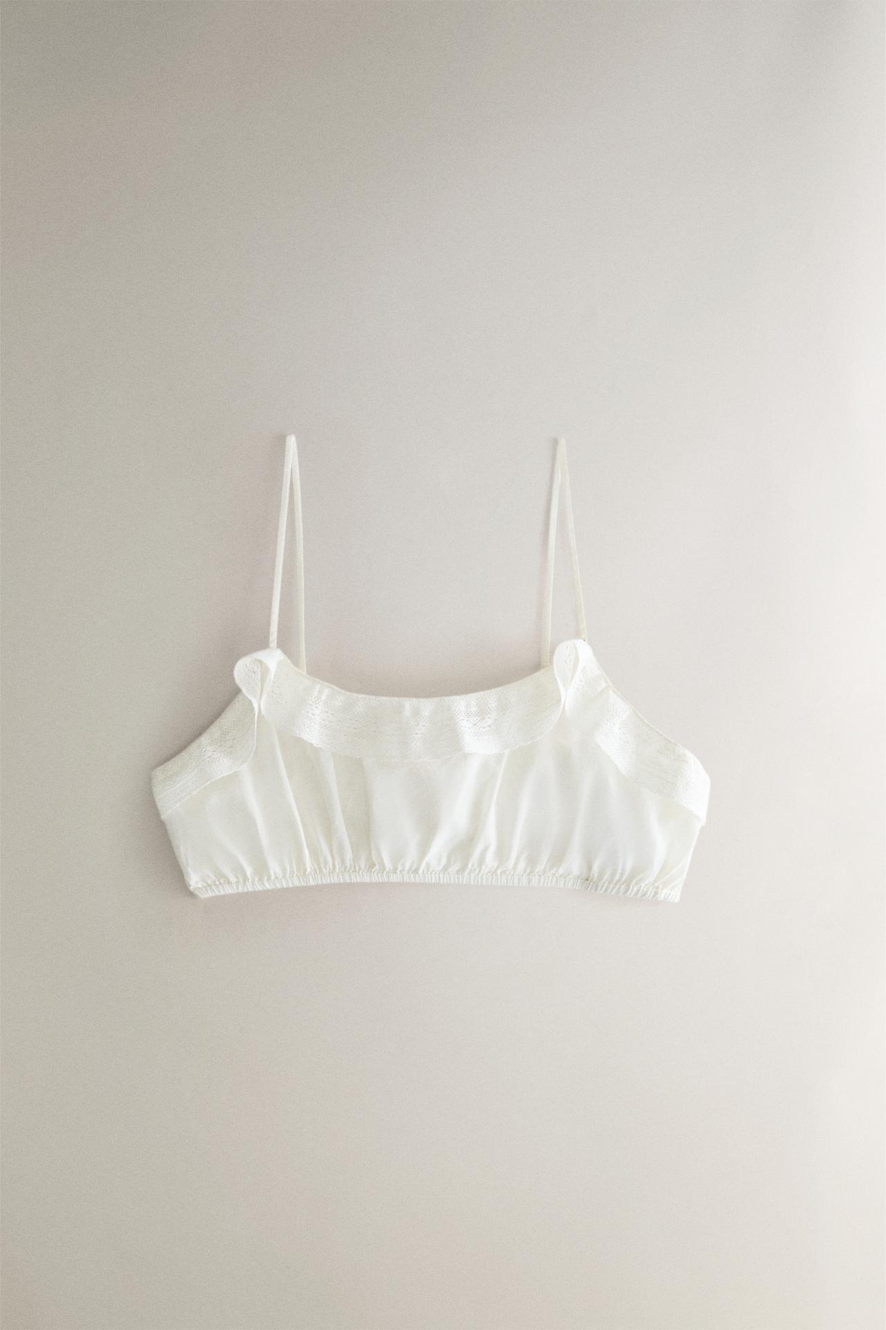LACE RUFFLE CROP TOP — Ivory