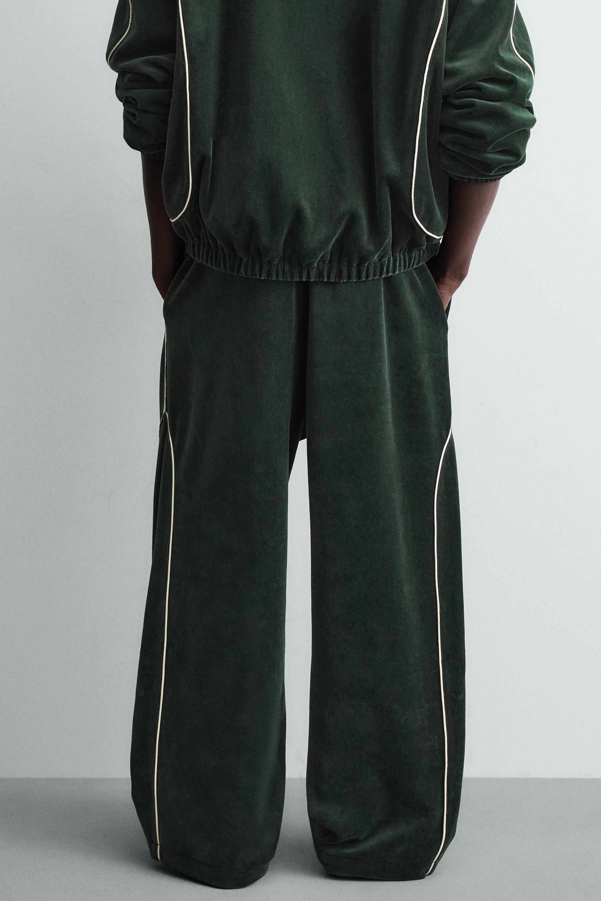 VELOUR PIPED PANTS
