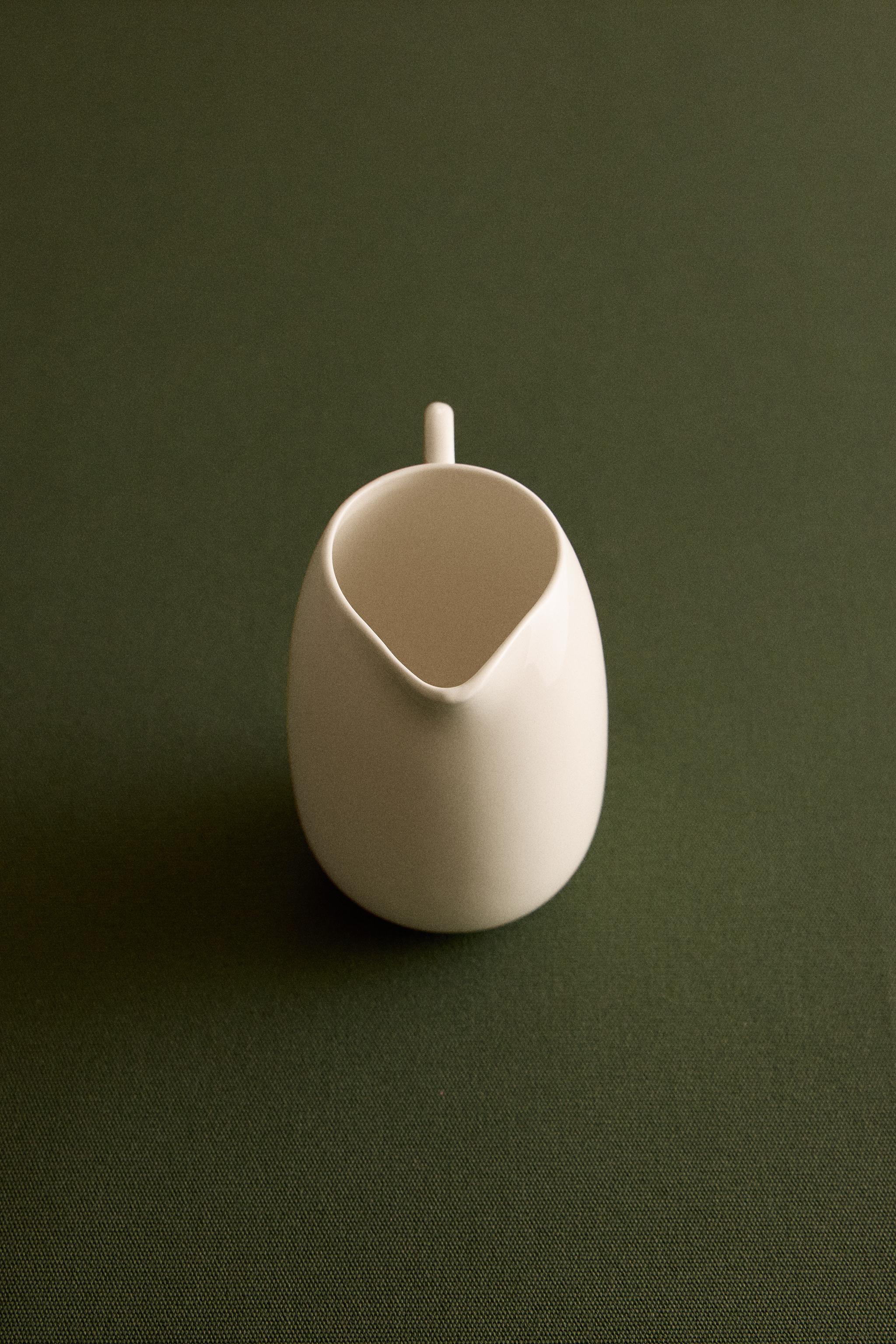 PLAIN STONEWARE MILK PITCHER