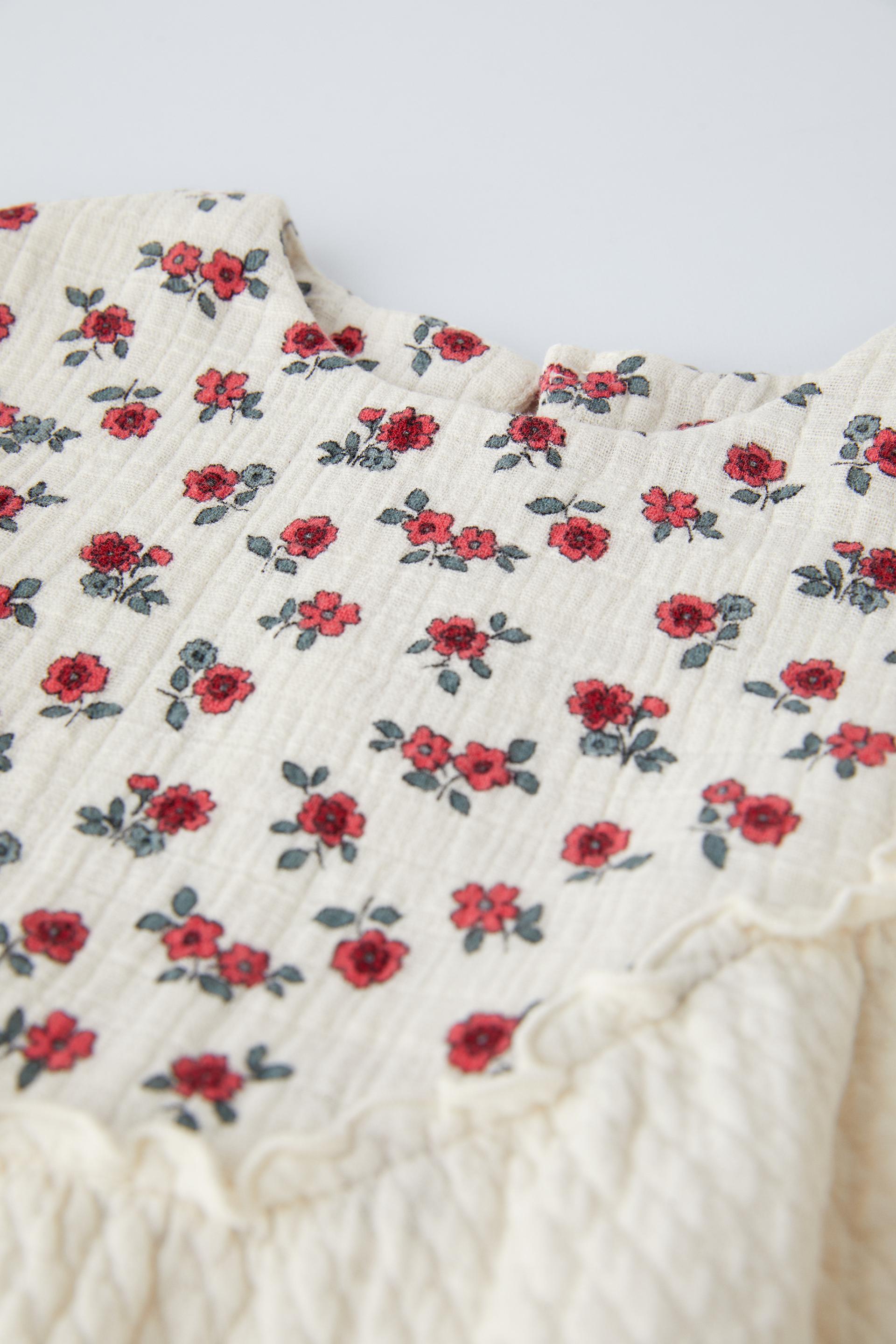 BLUSA COM TEXTURA FLORES - Cru