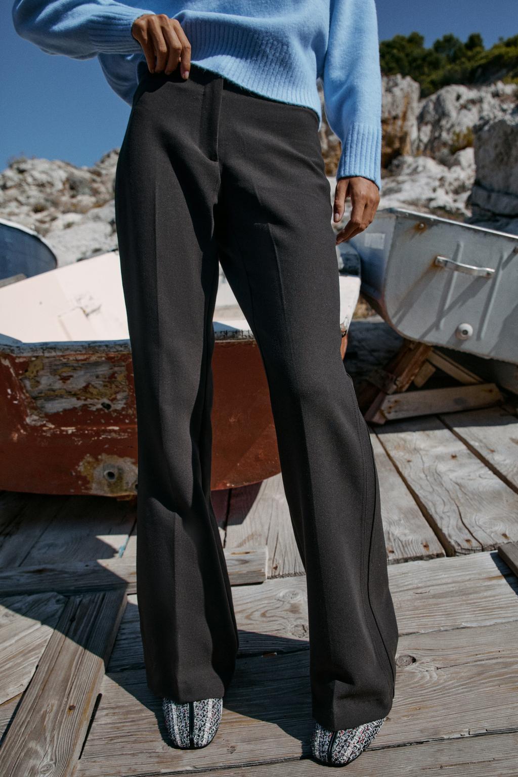 LOW-RISE FLARED TROUSERS