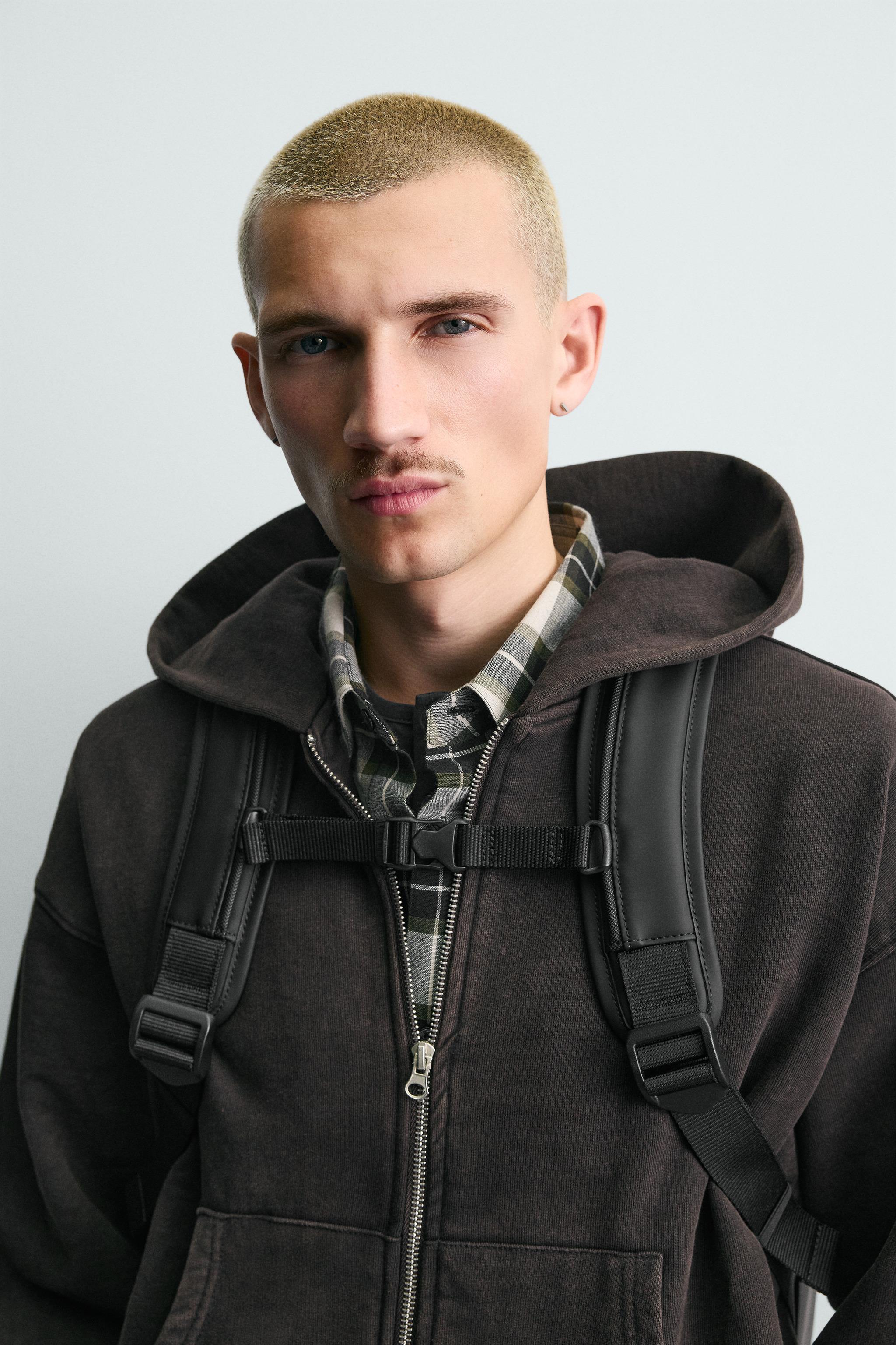 RUBBERIZED MULTI-POCKET BACKPACK