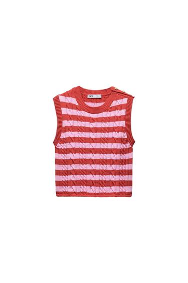 Red and pink striped sleeveless waistcoat with gold buttons on the shoulder. Visible label with the text "ZARA". White background.