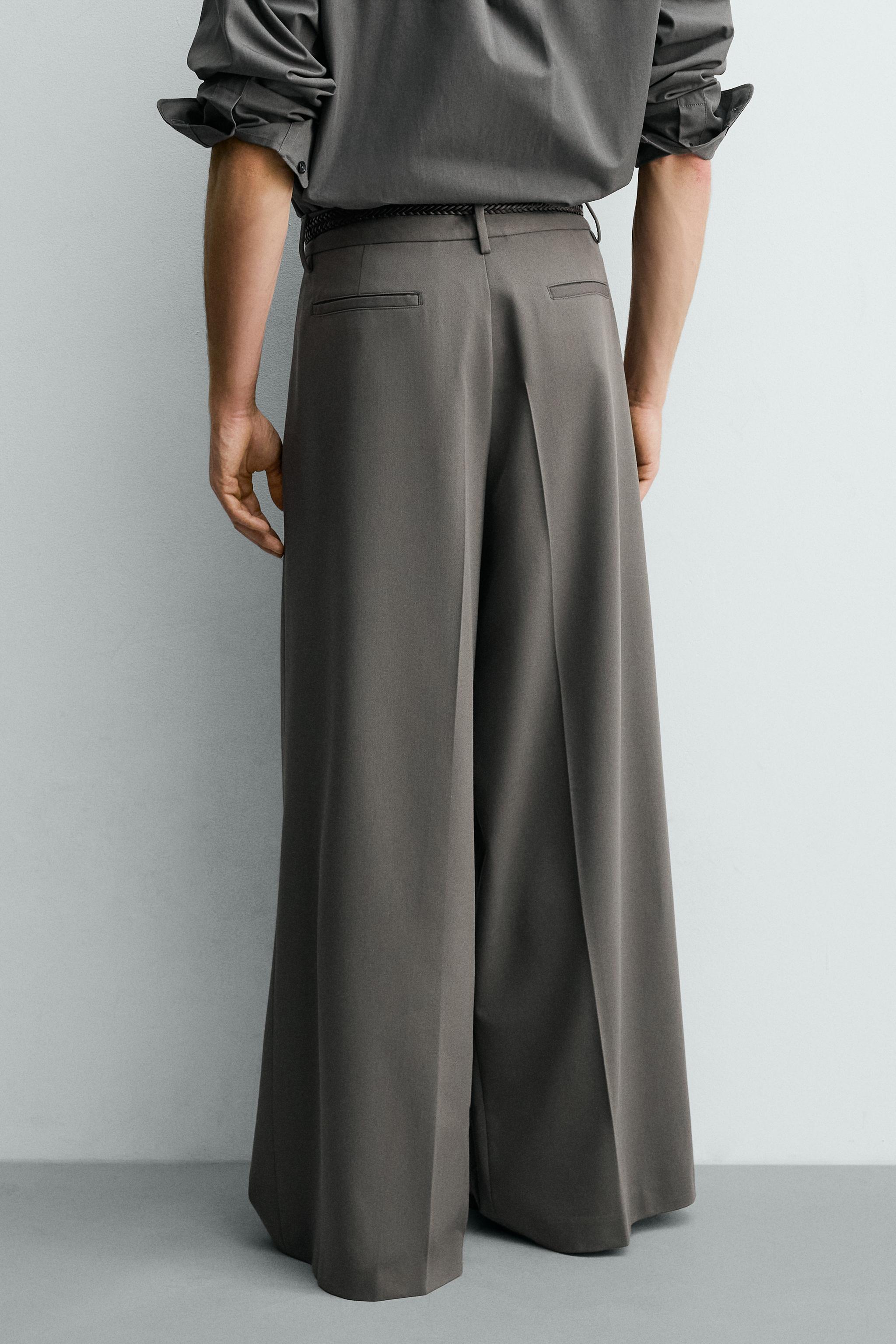 PLEATED WIDE FIT PANTS