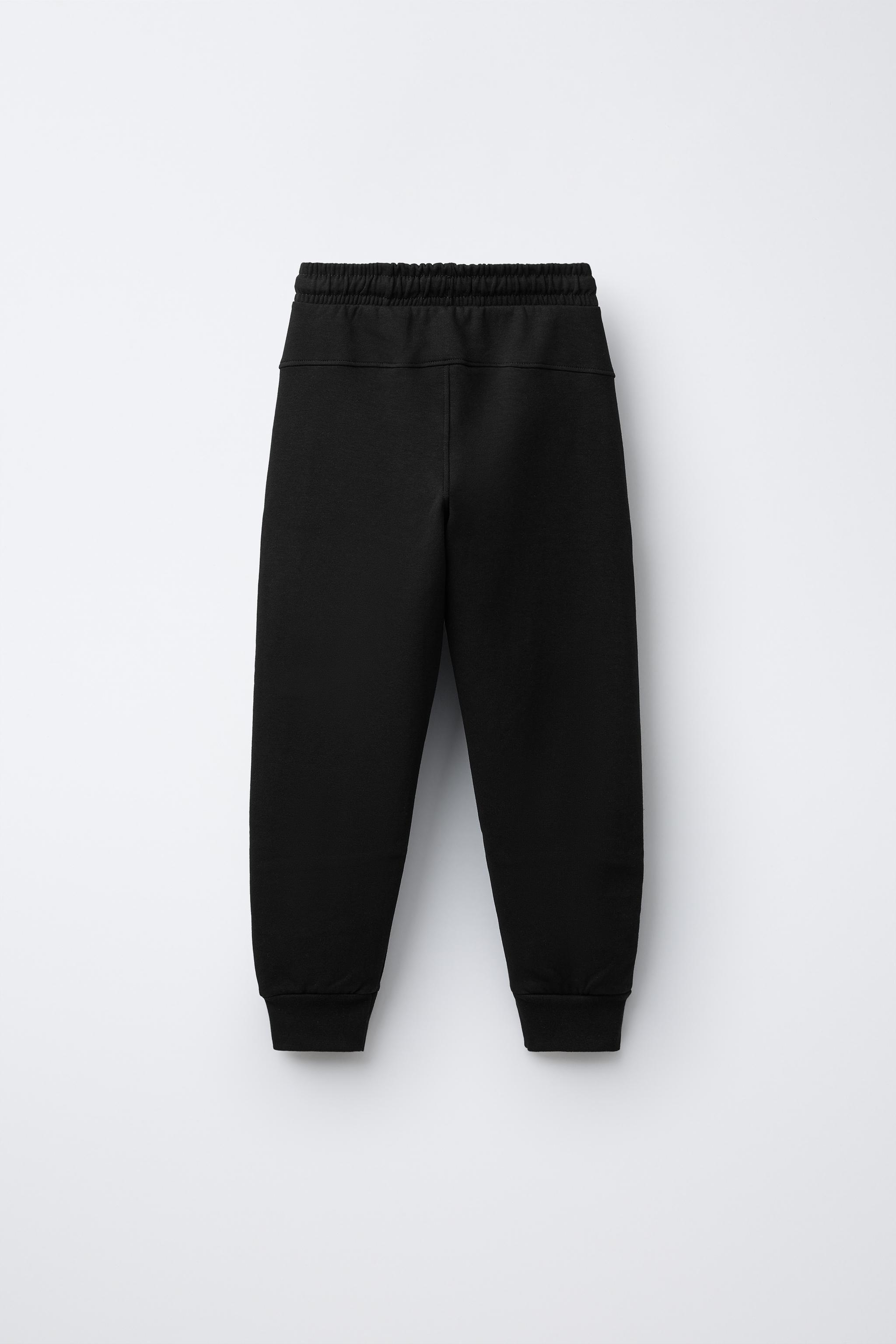 SPORTY INTERLOCK JOGGERS